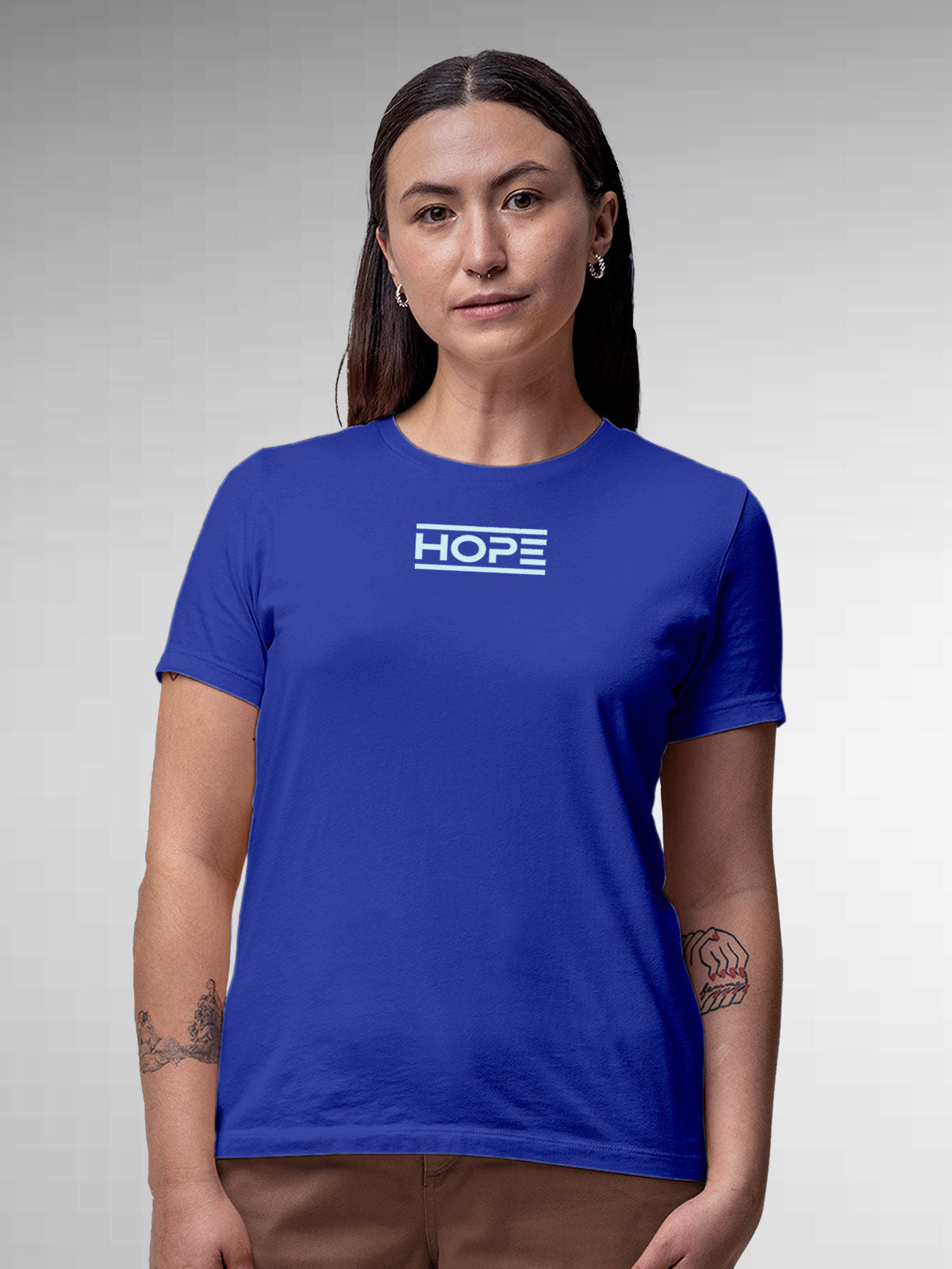 Model wearing Women's Blue Round Neck T-shirt with 'Hope' design, offering effortless style and premium comfort
