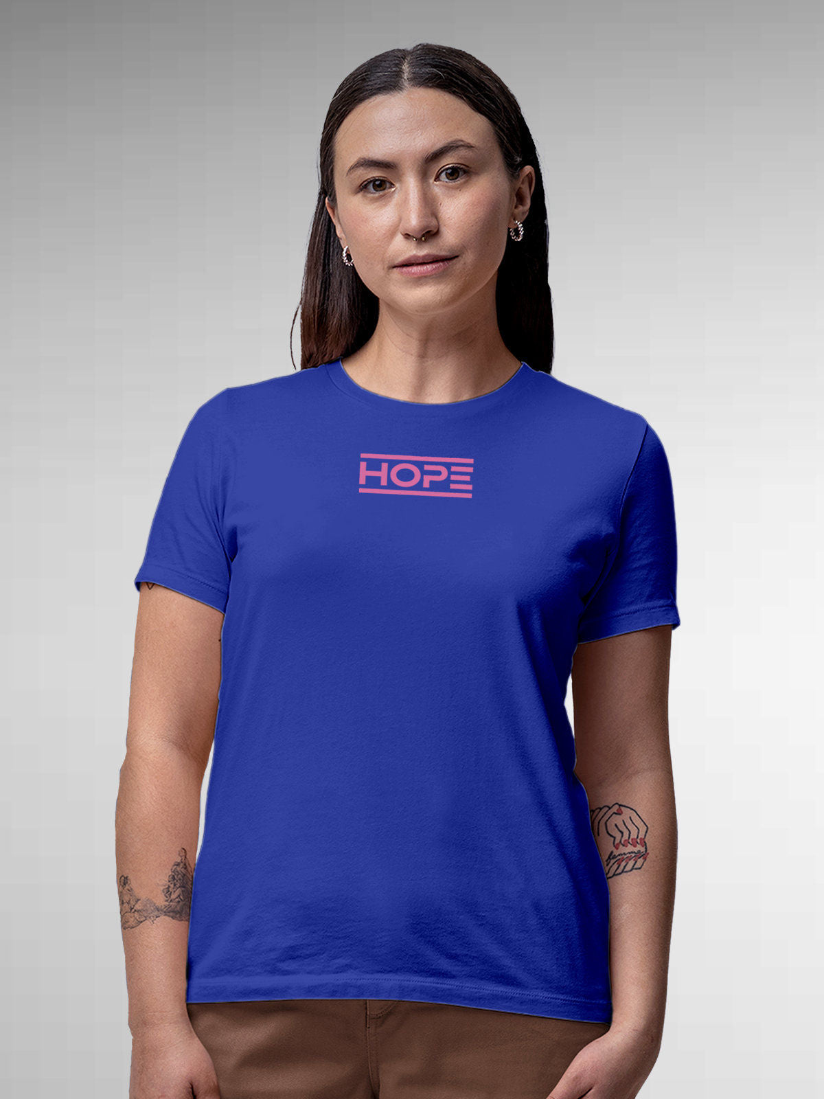Model wearing Women's Blue Round Neck T-shirt with 'Hope' design, offering effortless style and premium comfort