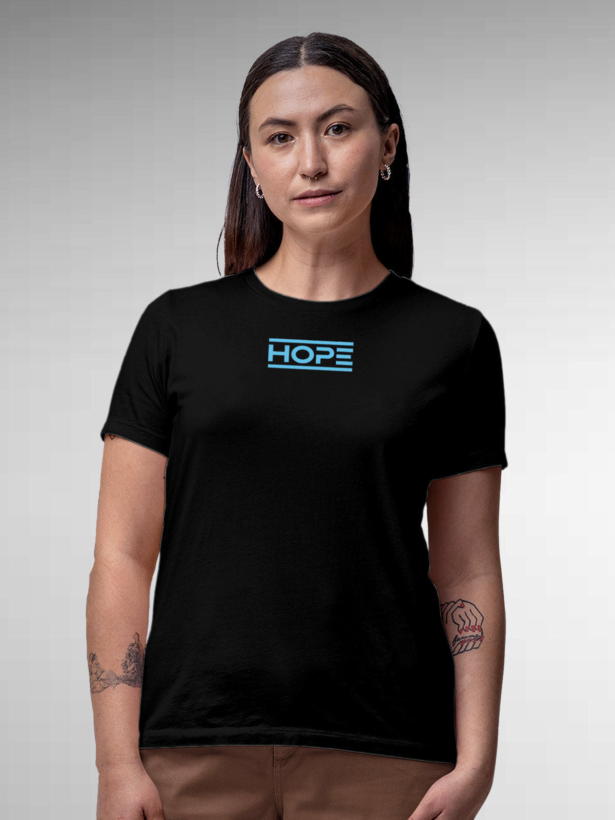 Model wearing Women's Black Round Neck T-shirt with 'Hope' design, offering effortless style and premium comfort