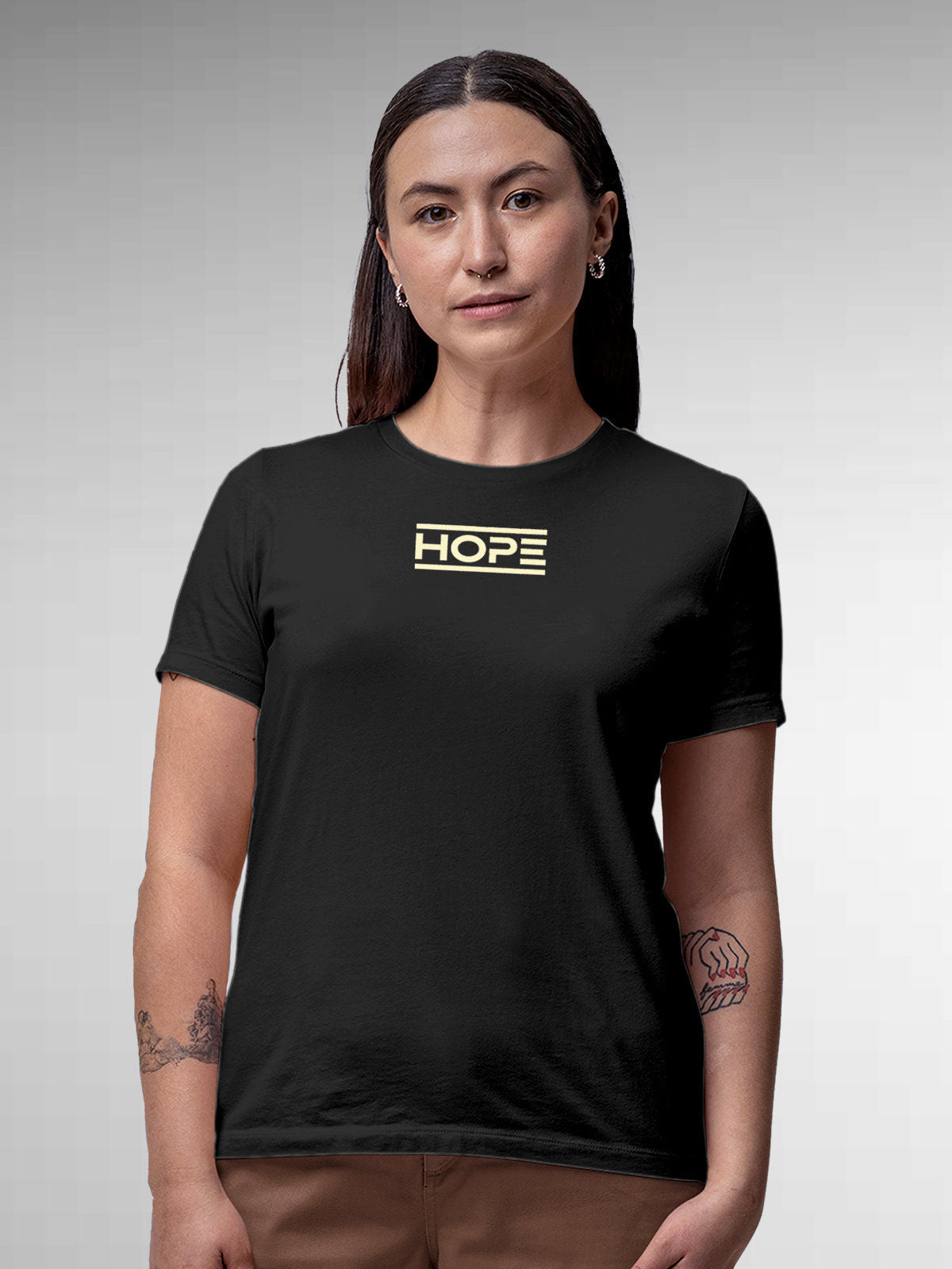 Model wearing Women's Dark Grey Round Neck T-shirt with 'Hope' design, offering effortless style and premium comfort