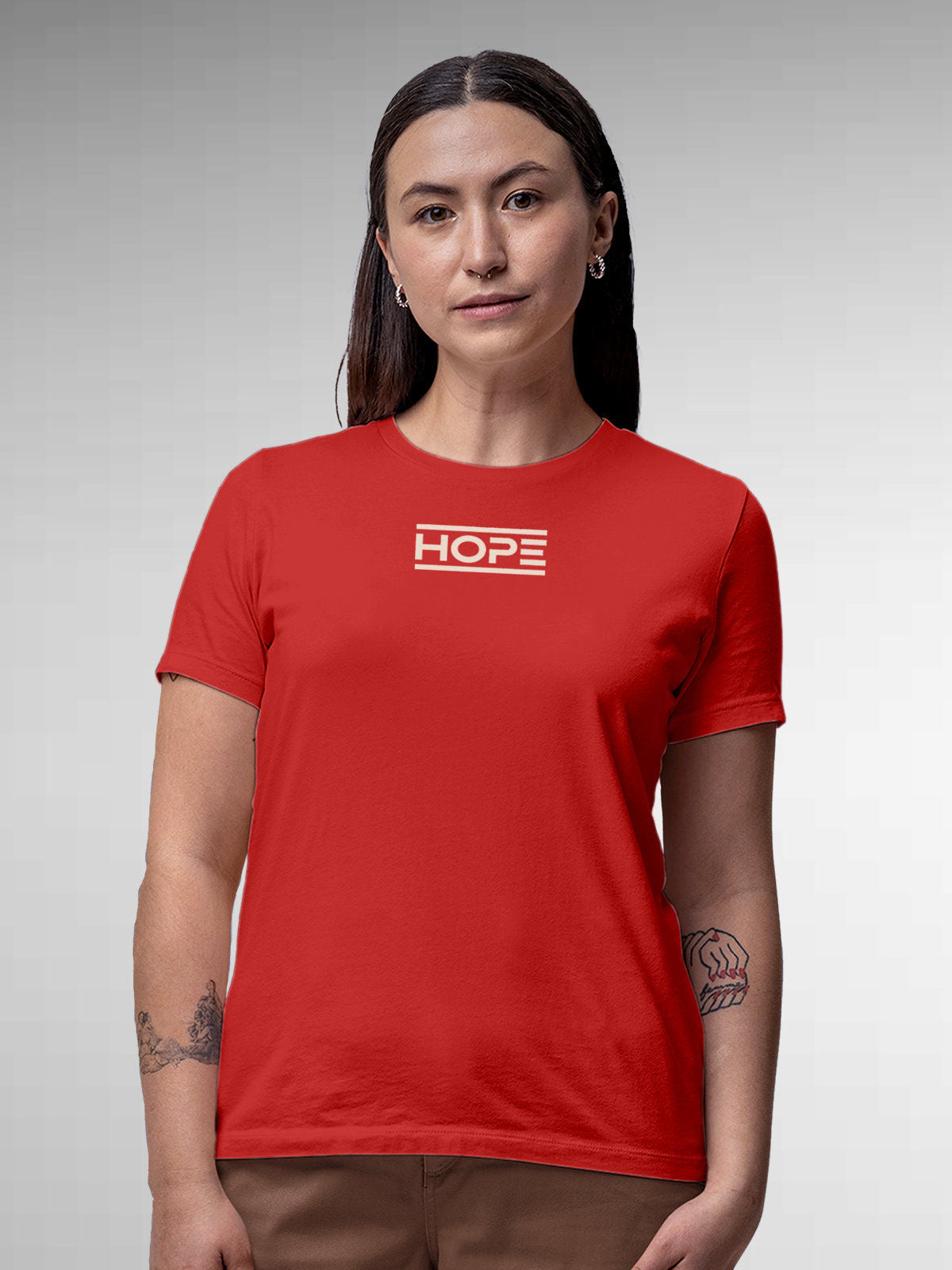 Model wearing Women's Red Round Neck T-shirt with 'Hope' design, offering effortless style and premium comfort