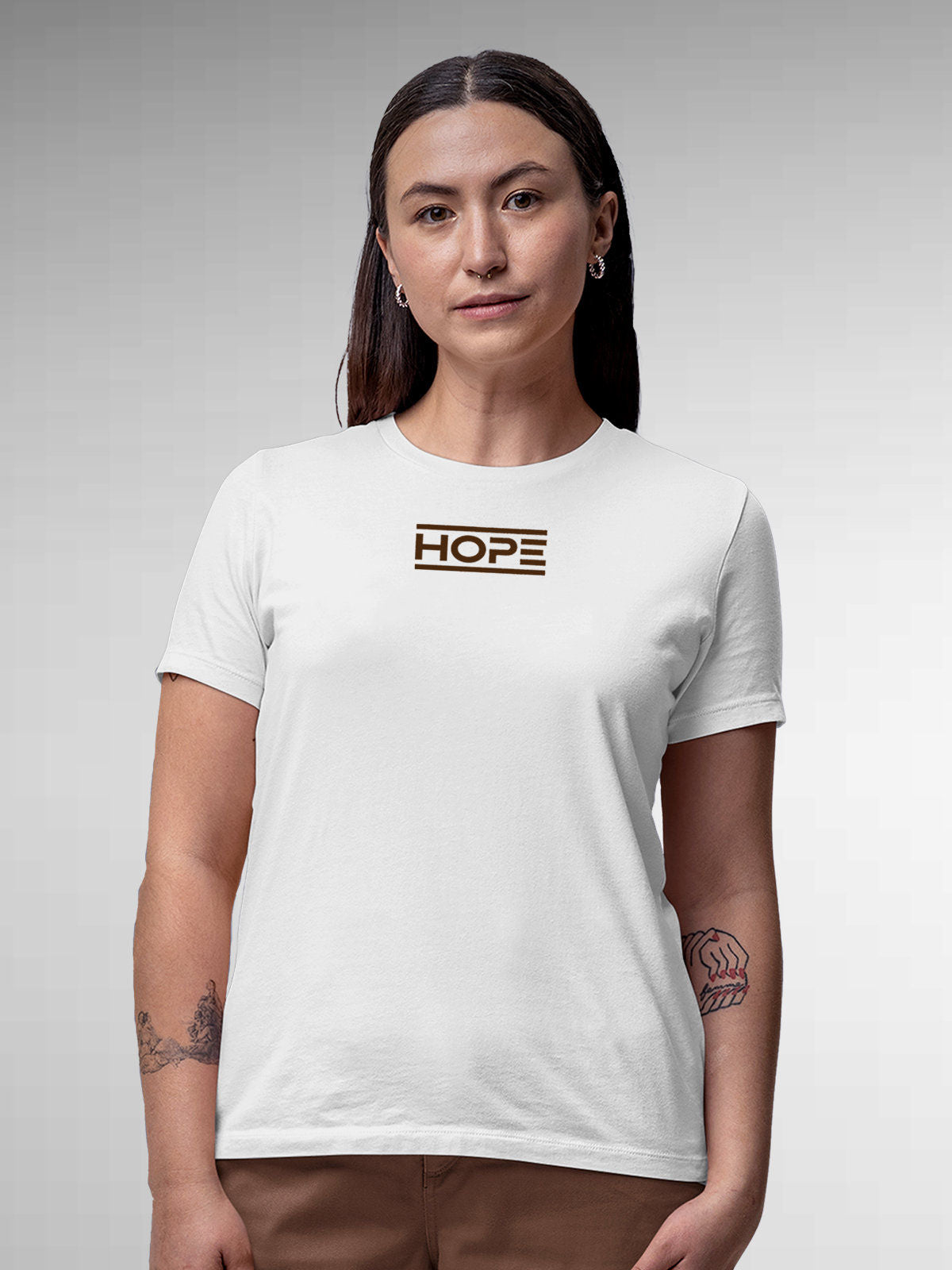 Model wearing Women's White Round Neck T-shirt with 'Hope' design, offering effortless style and premium comfort