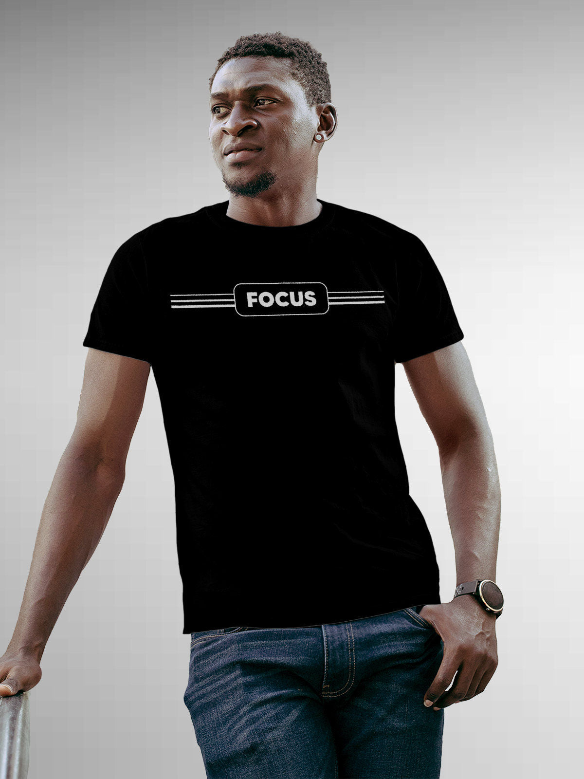 Model wearing Men's Black Round Neck T-shirt with 'Focus' design, offering effortless style and premium comfort