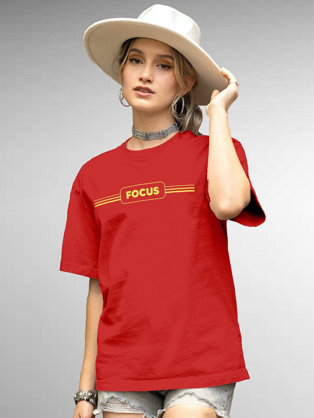 Model wearing Women's Red Round Neck T-shirt with 'Focus' design, offering effortless style and premium comfort