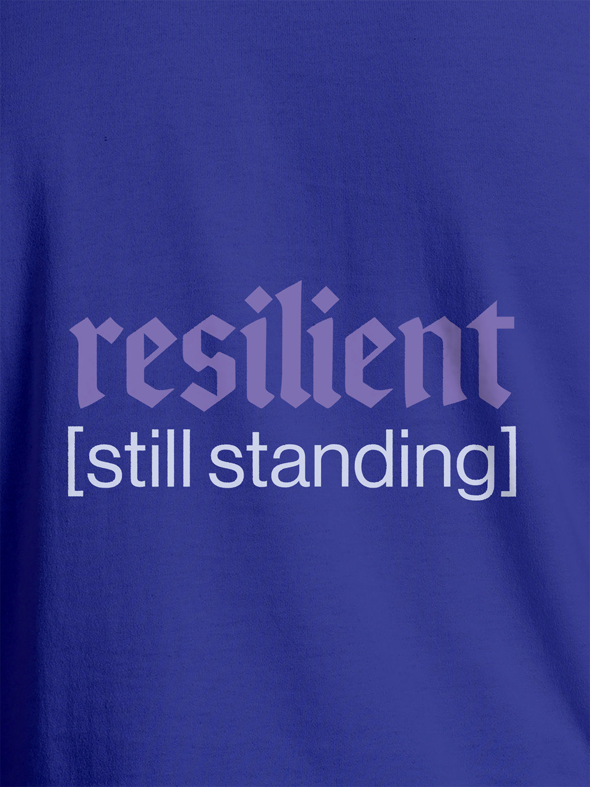 Close up of 'Resilient' design on Women's Blue Round Neck T-shirt, highlighting intricate details and vibrant print.