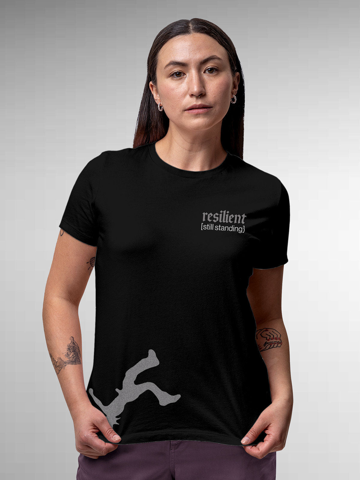 Model wearing Women's Black Round Neck T-shirt with 'Resilient' design, offering effortless style and premium comfort