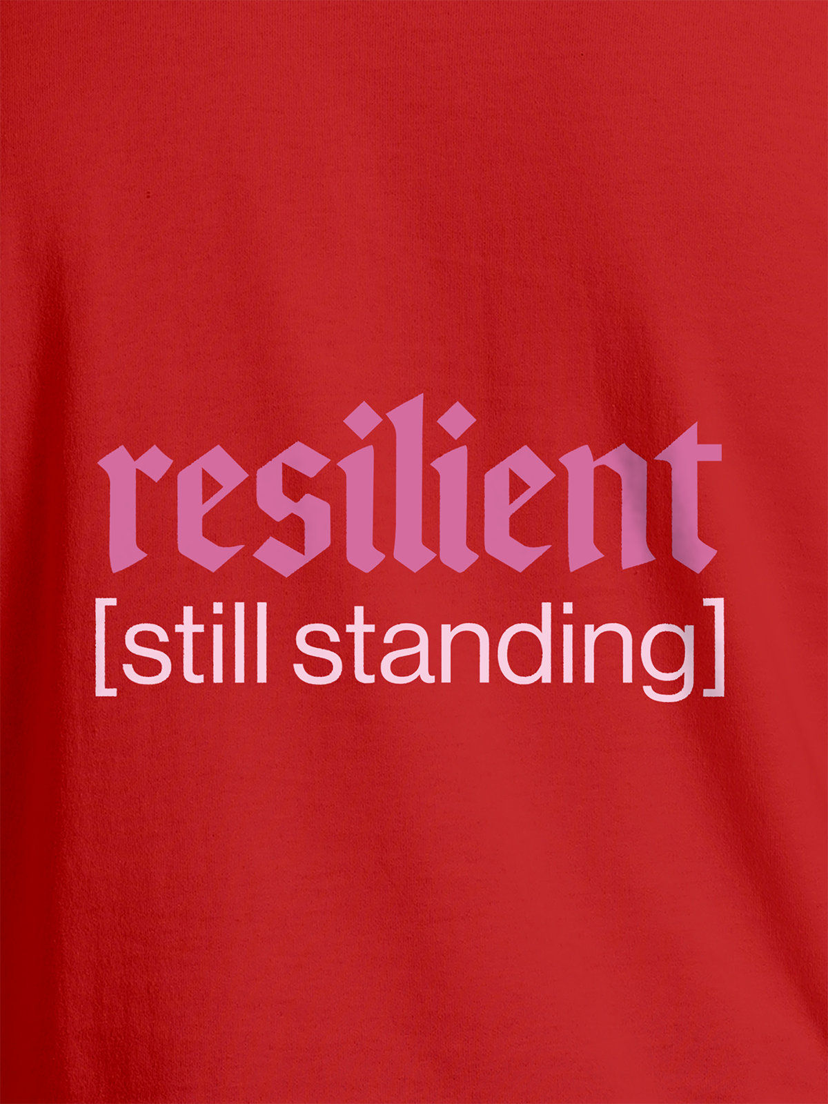 Close up of 'Resilient' design on Men's Red Round Neck T-shirt, highlighting intricate details and vibrant print.