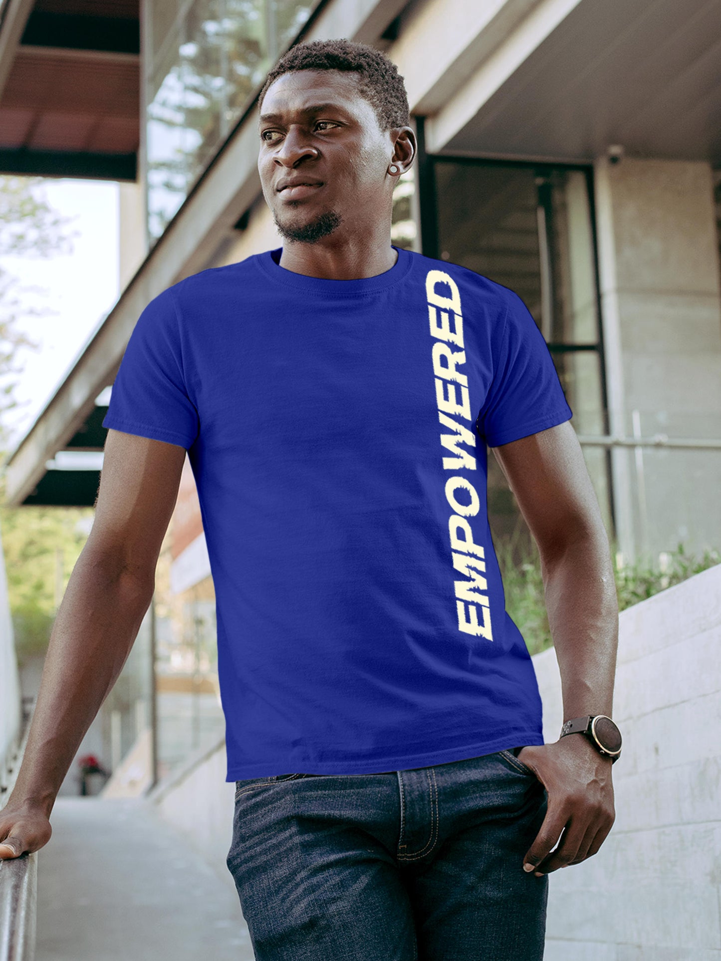 Model wearing Men's Blue Round Neck T-shirt with 'Empowered' design, offering effortless style and premium comfort