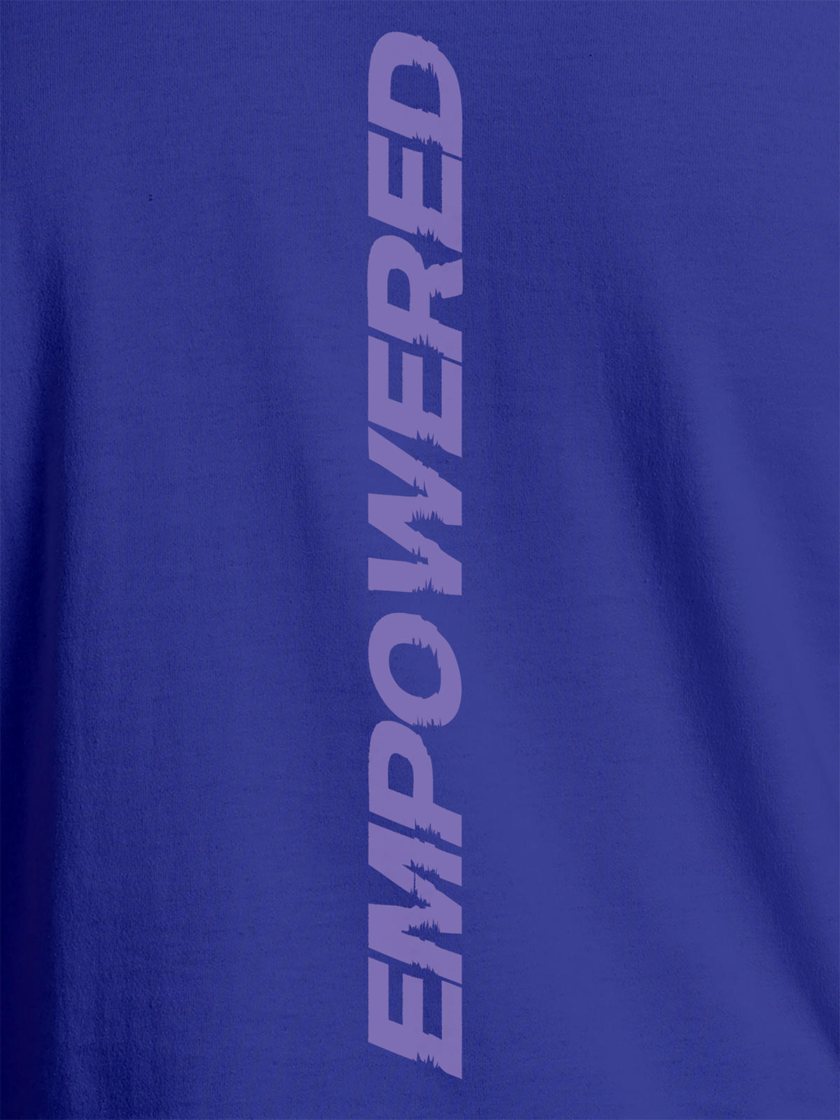 Close up of 'Empowered' design on Men's Blue Round Neck T-shirt, highlighting intricate details and vibrant print.