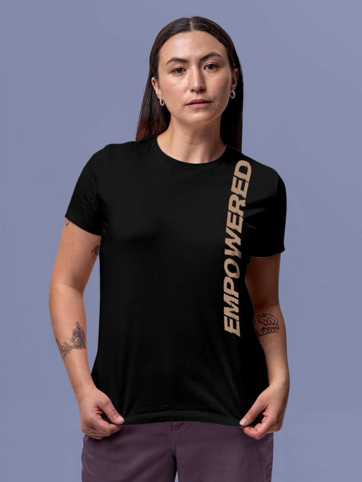 Model wearing Women's Black Round Neck T-shirt with 'Empowered' design, offering effortless style and premium comfort