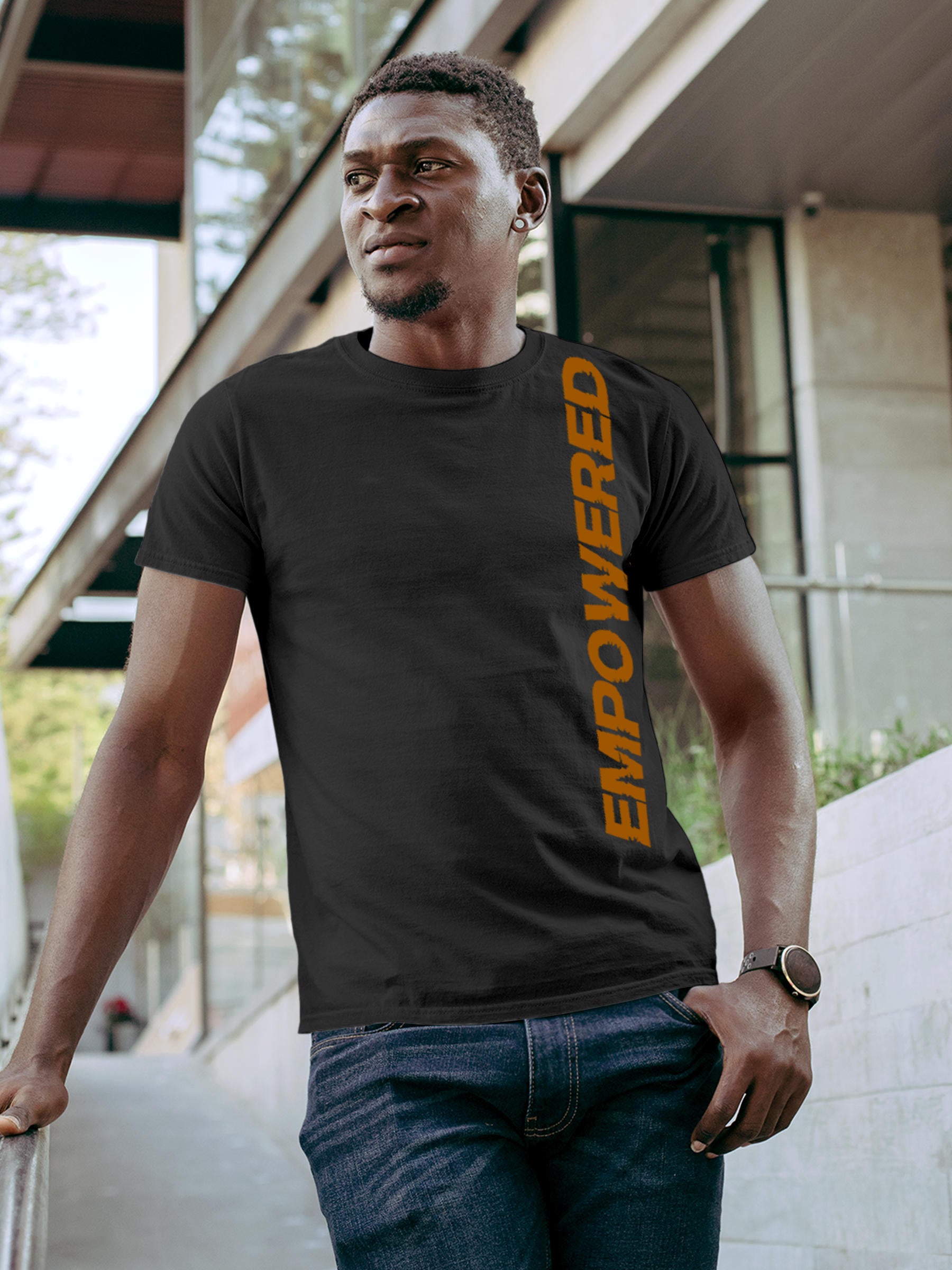 Model wearing Men's Dark Grey Round Neck T-shirt with 'Empowered' design, offering effortless style and premium comfort