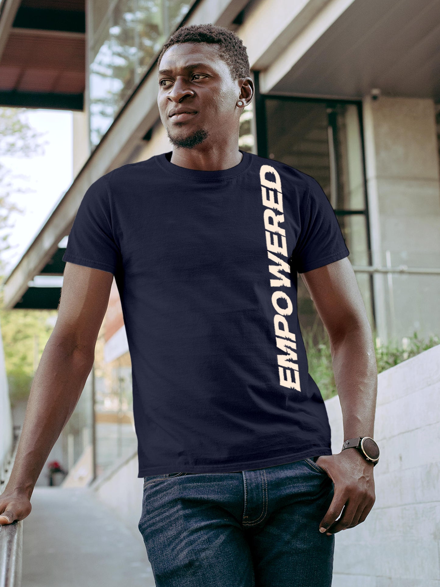 Model wearing Men's Navy Blue Round Neck T-shirt with 'Empowered' design, offering effortless style and premium comfort