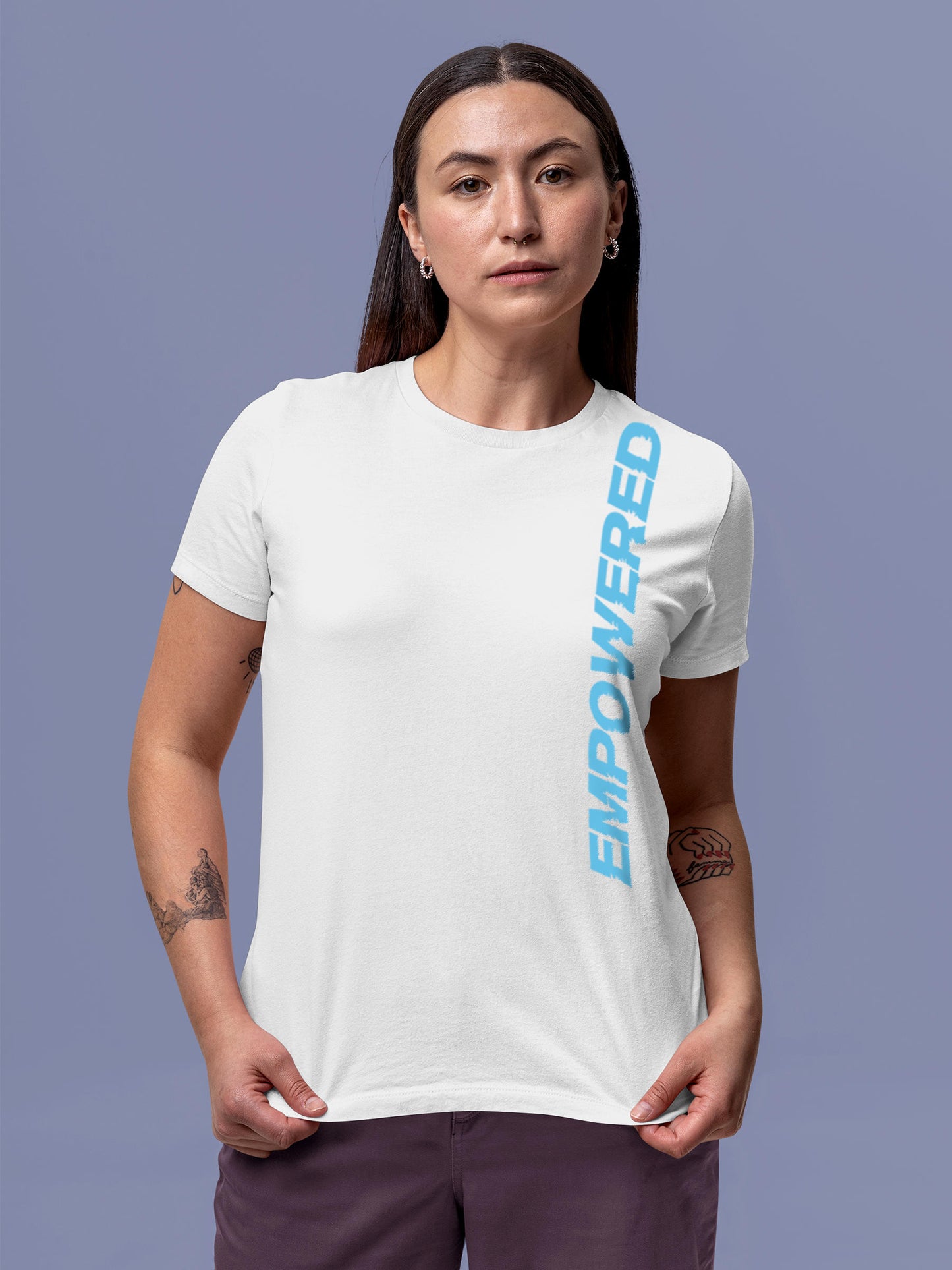 Model wearing Women's White Round Neck T-shirt with 'Empowered' design, offering effortless style and premium comfort