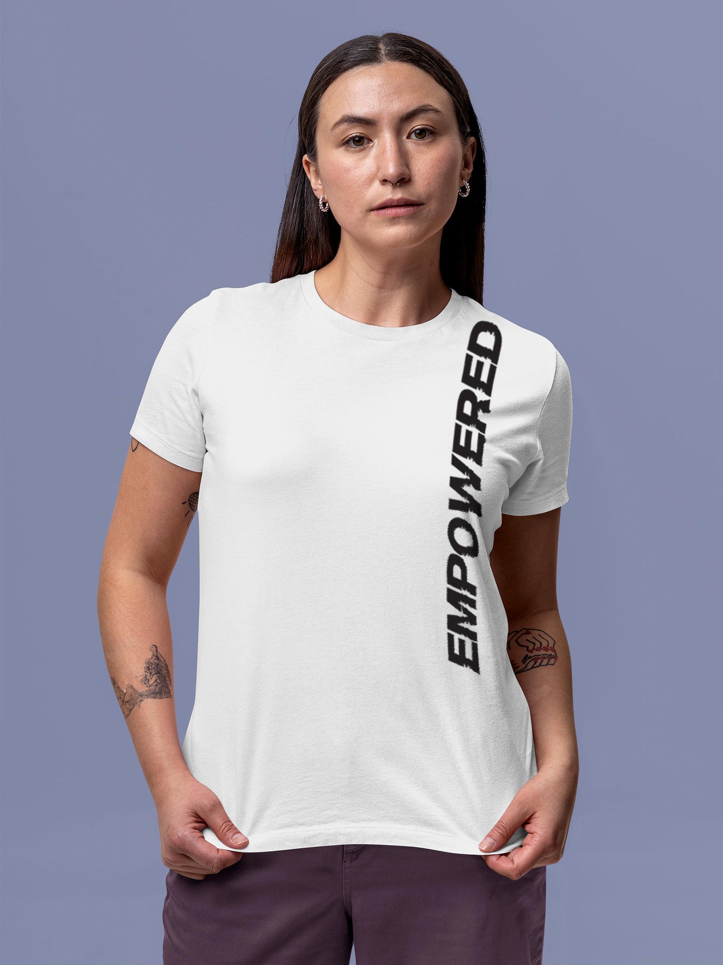 Model wearing Women's White Round Neck T-shirt with 'Empowered' design, offering effortless style and premium comfort