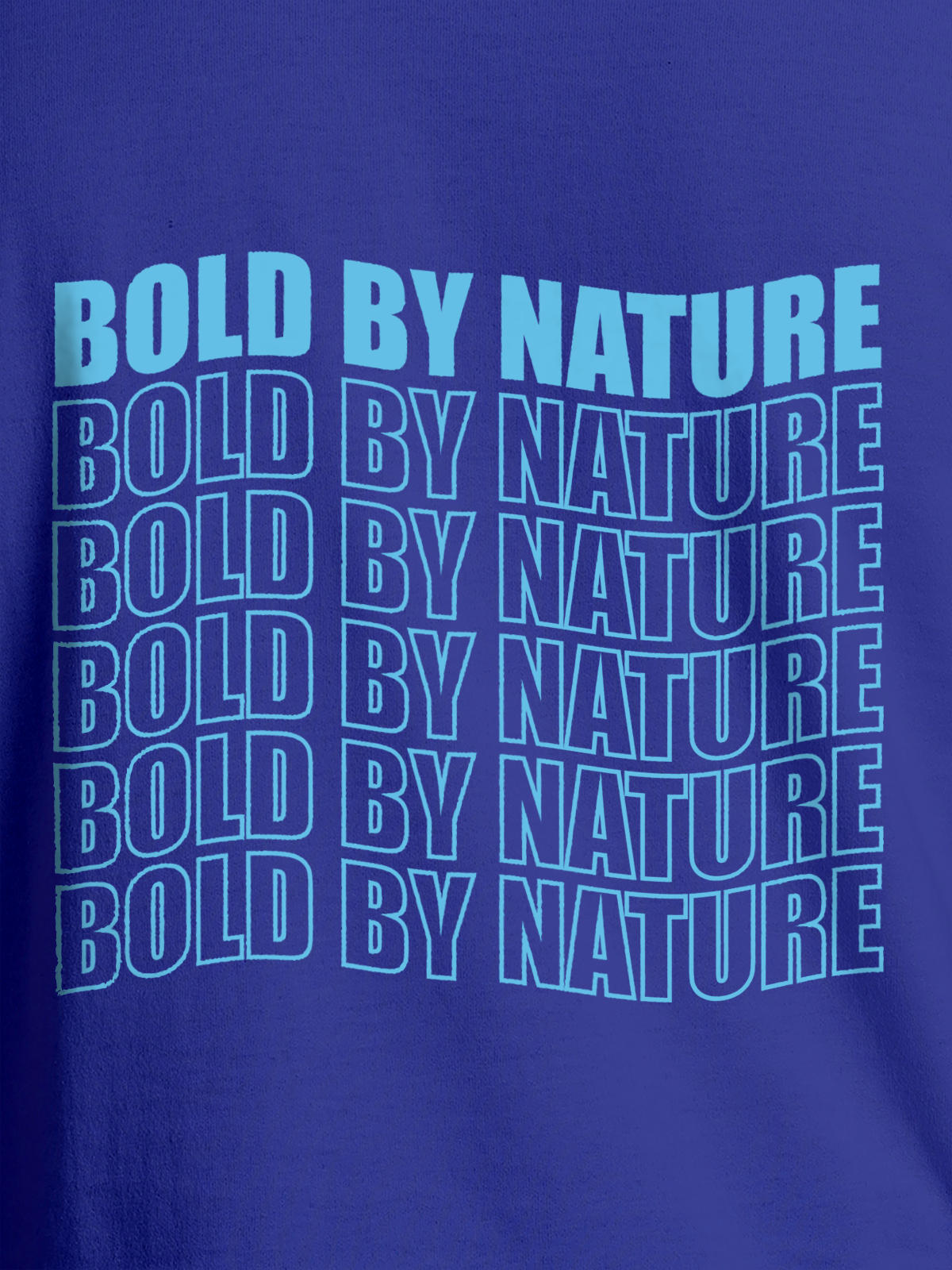 Close up of 'Bold By Nature' design on Men's Blue Round Neck T-shirt, highlighting intricate details and vibrant print.