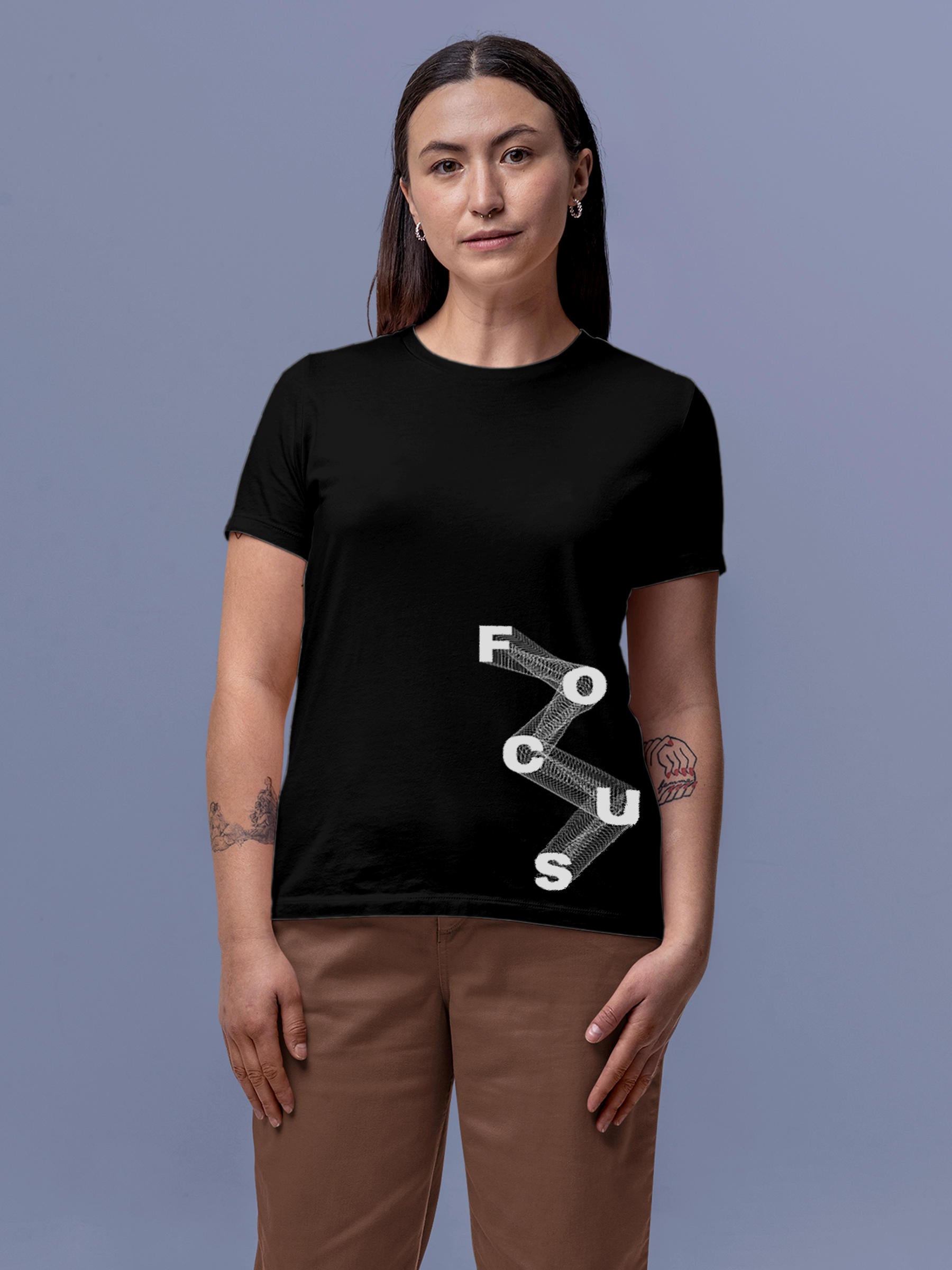 Model wearing Women's Black Round Neck T-shirt with 'Focus' design, offering effortless style and premium comfort