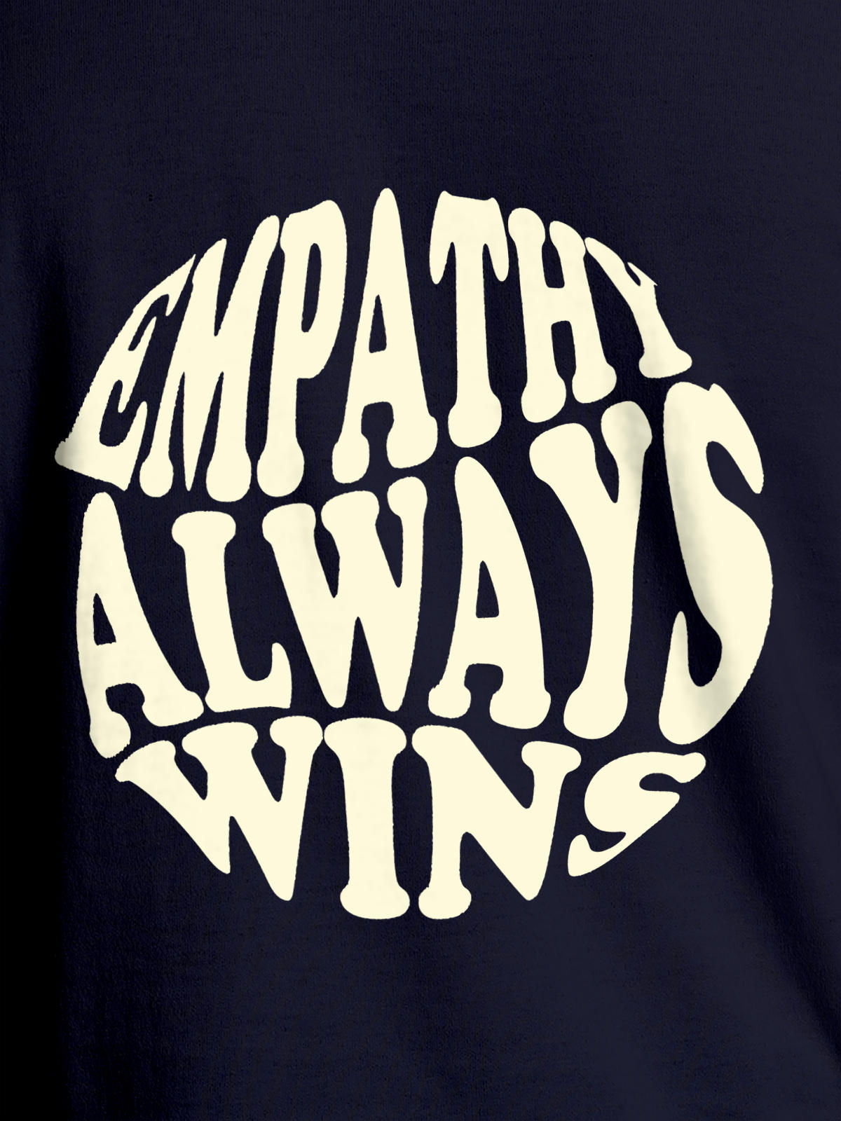 Close up of 'Empathy Always Wins' design on Men's Navy Blue Round Neck T-shirt, highlighting intricate details and vibrant print.