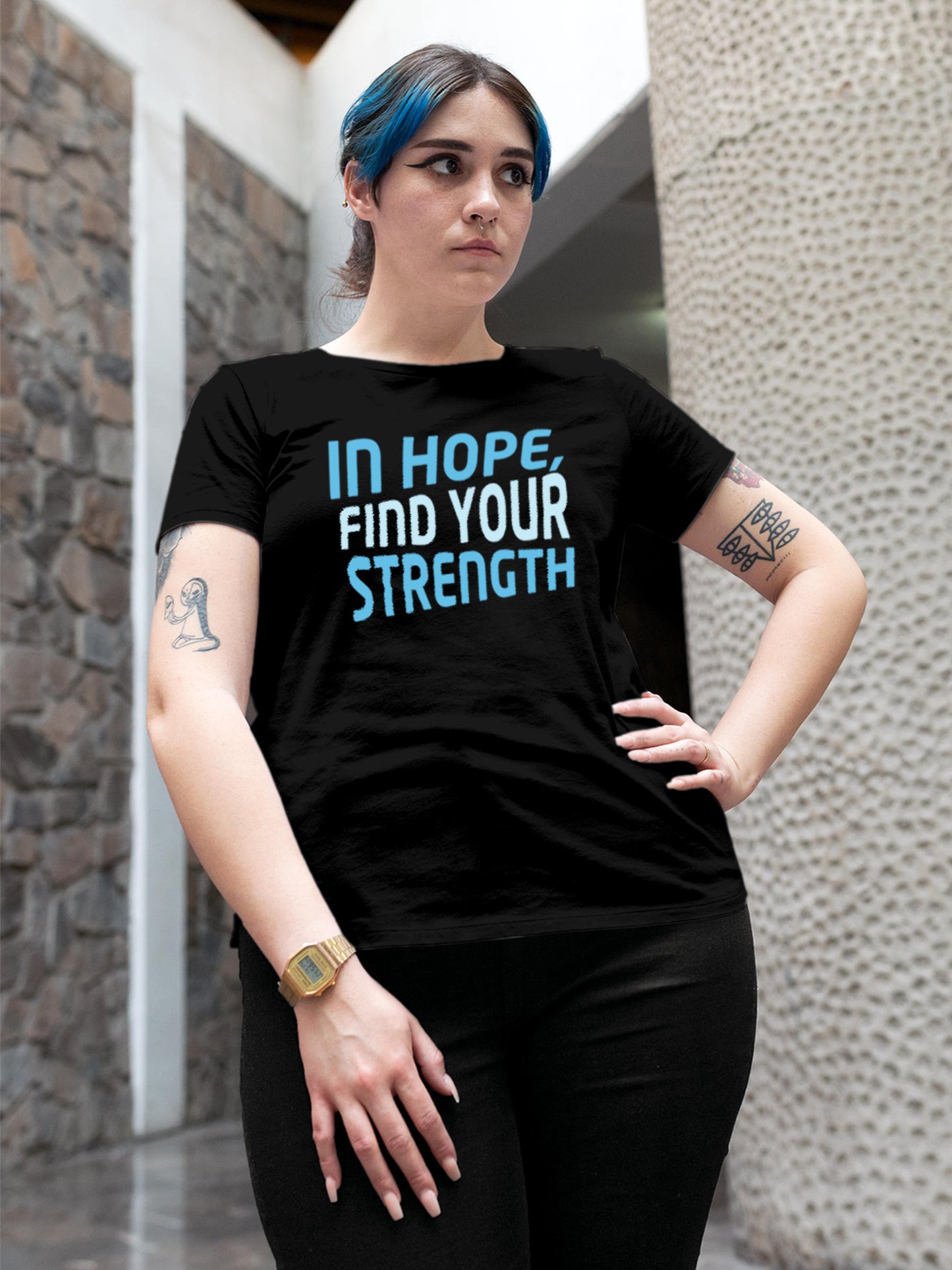 Model wearing Women's Black Round Neck T-shirt with 'In Hope, Find Your Strength' design, offering effortless style and premium comfort