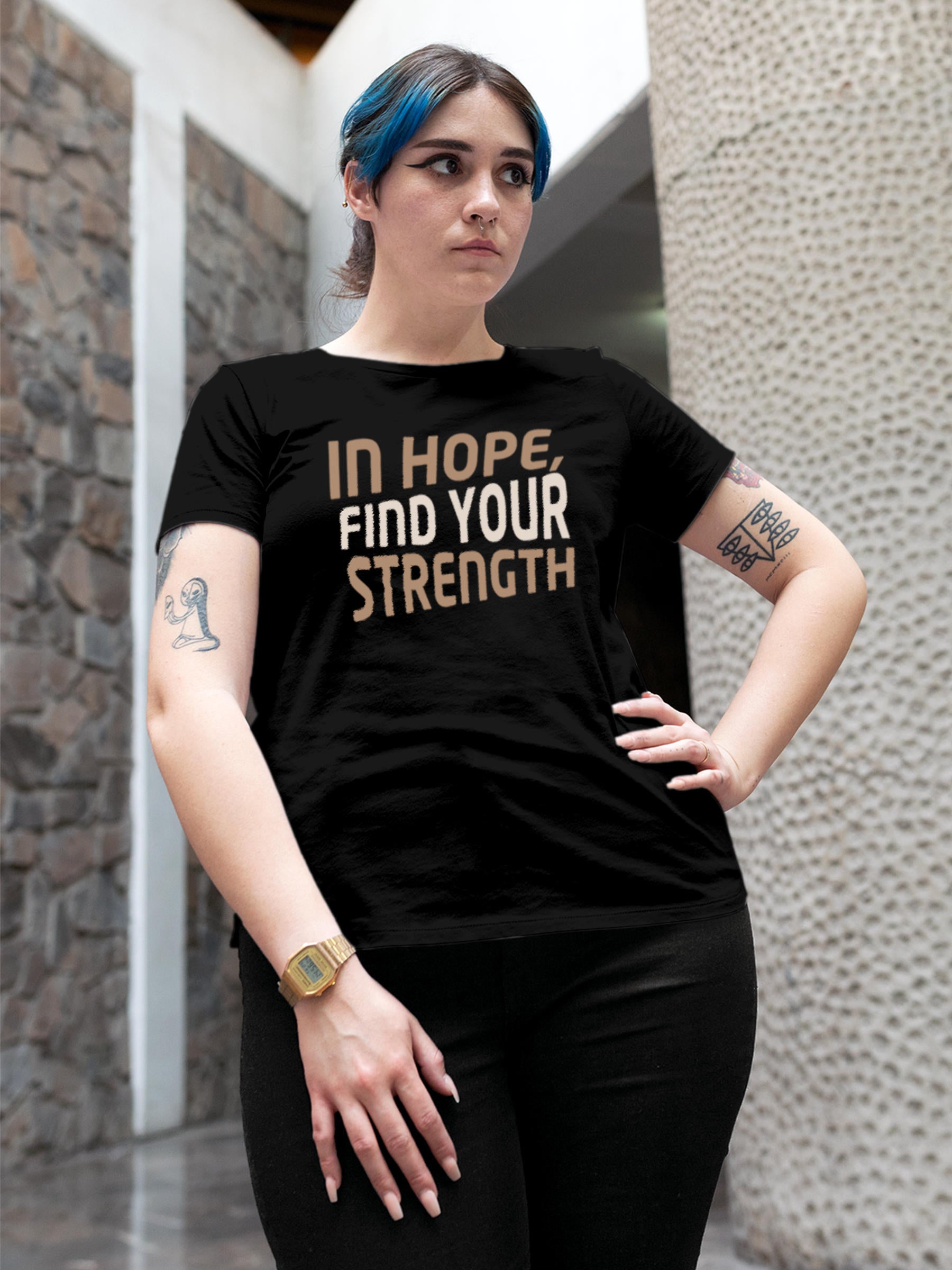 Model wearing Women's Black Round Neck T-shirt with 'In Hope, Find Your Strength' design, offering effortless style and premium comfort