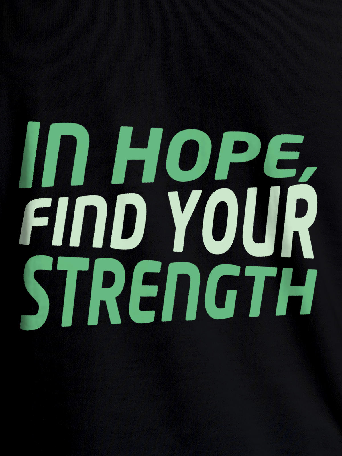 Close up of 'In Hope, Find Your Strength' design on Women's Black Round Neck T-shirt, highlighting intricate details and vibrant print.