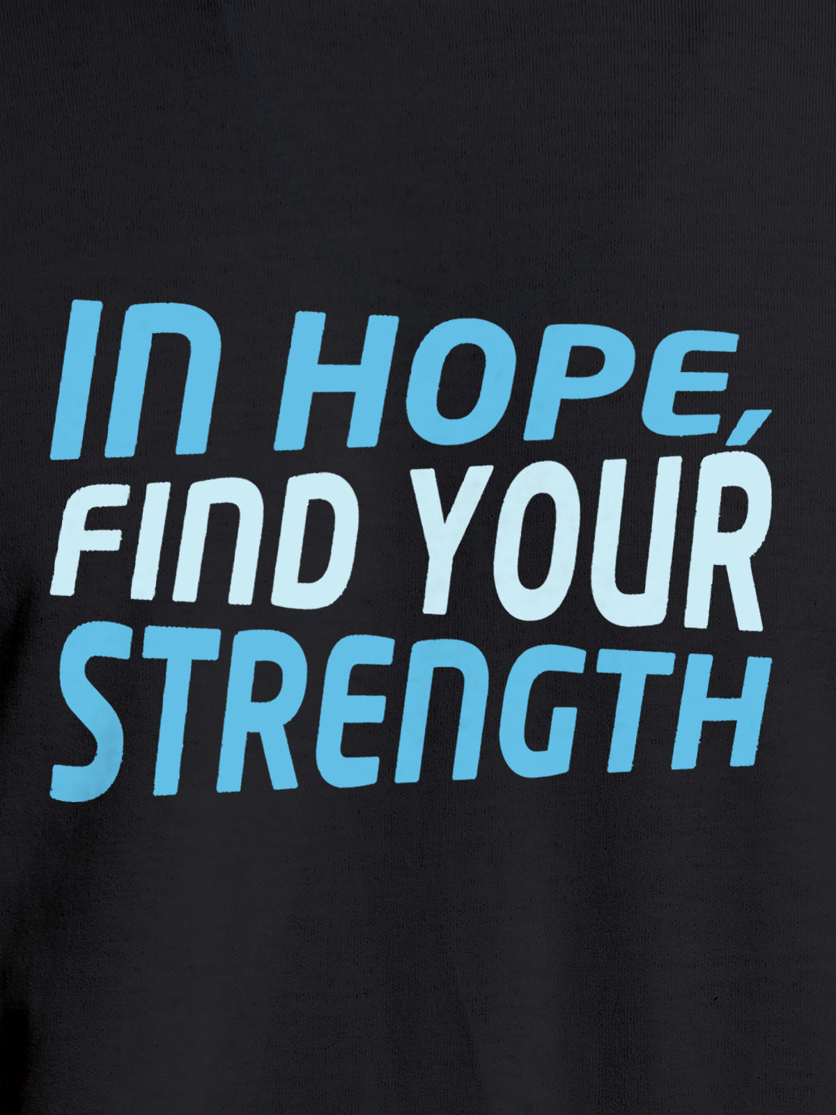 Close up of 'In Hope, Find Your Strength' design on Men's Dark Grey Round Neck T-shirt, highlighting intricate details and vibrant print.
