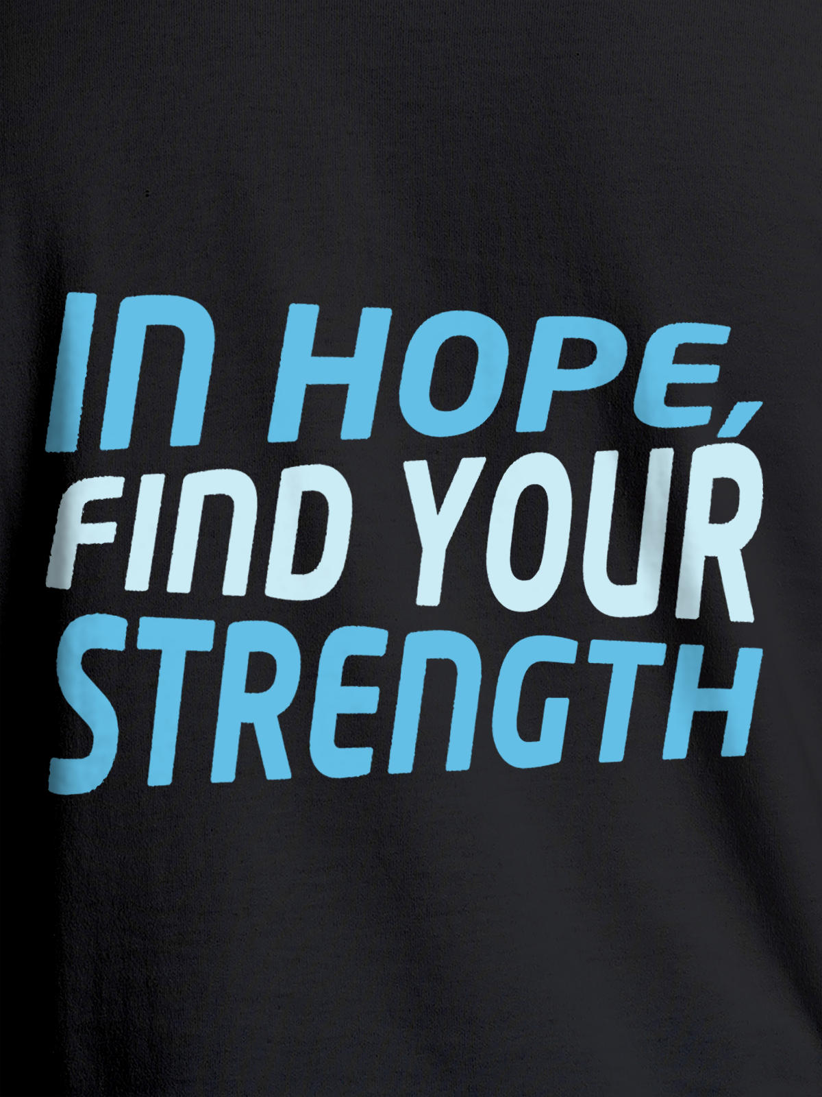 Close up of 'In Hope, Find Your Strength' design on Women's Dark Grey Round Neck T-shirt, highlighting intricate details and vibrant print.