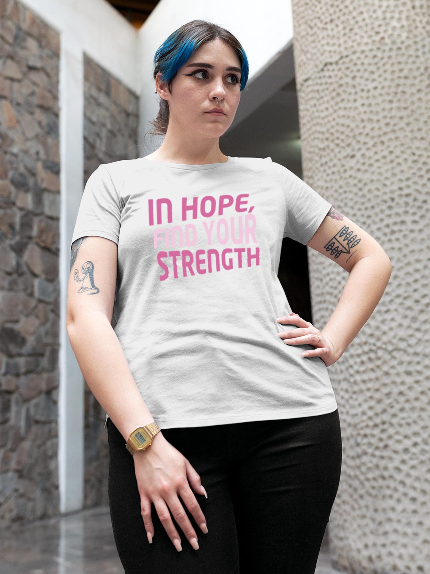 Model wearing Women's White Round Neck T-shirt with 'In Hope, Find Your Strength' design, offering effortless style and premium comfort