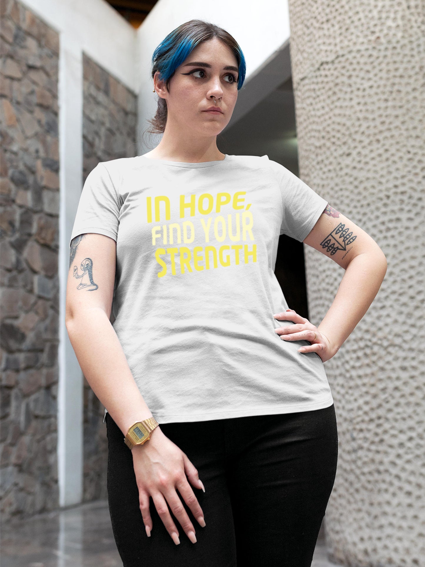 Model wearing Women's White Round Neck T-shirt with 'In Hope, Find Your Strength' design, offering effortless style and premium comfort