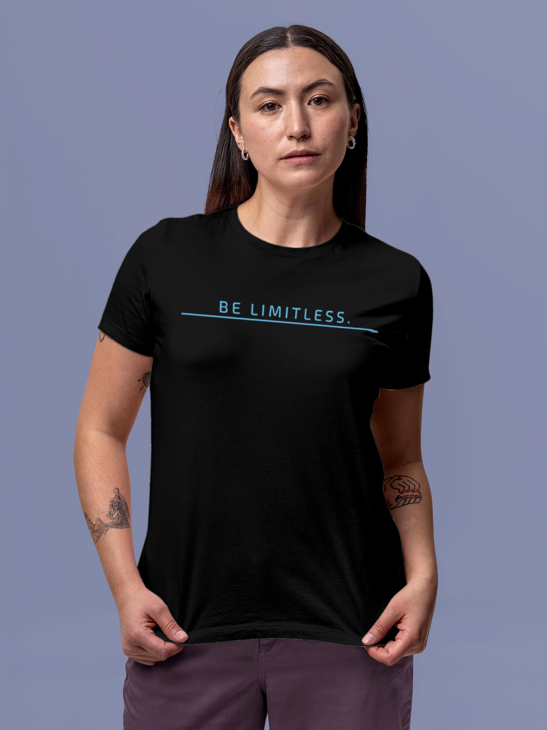 Model wearing Women's Black Round Neck T-shirt with 'Be Limitless' design, offering effortless style and premium comfort