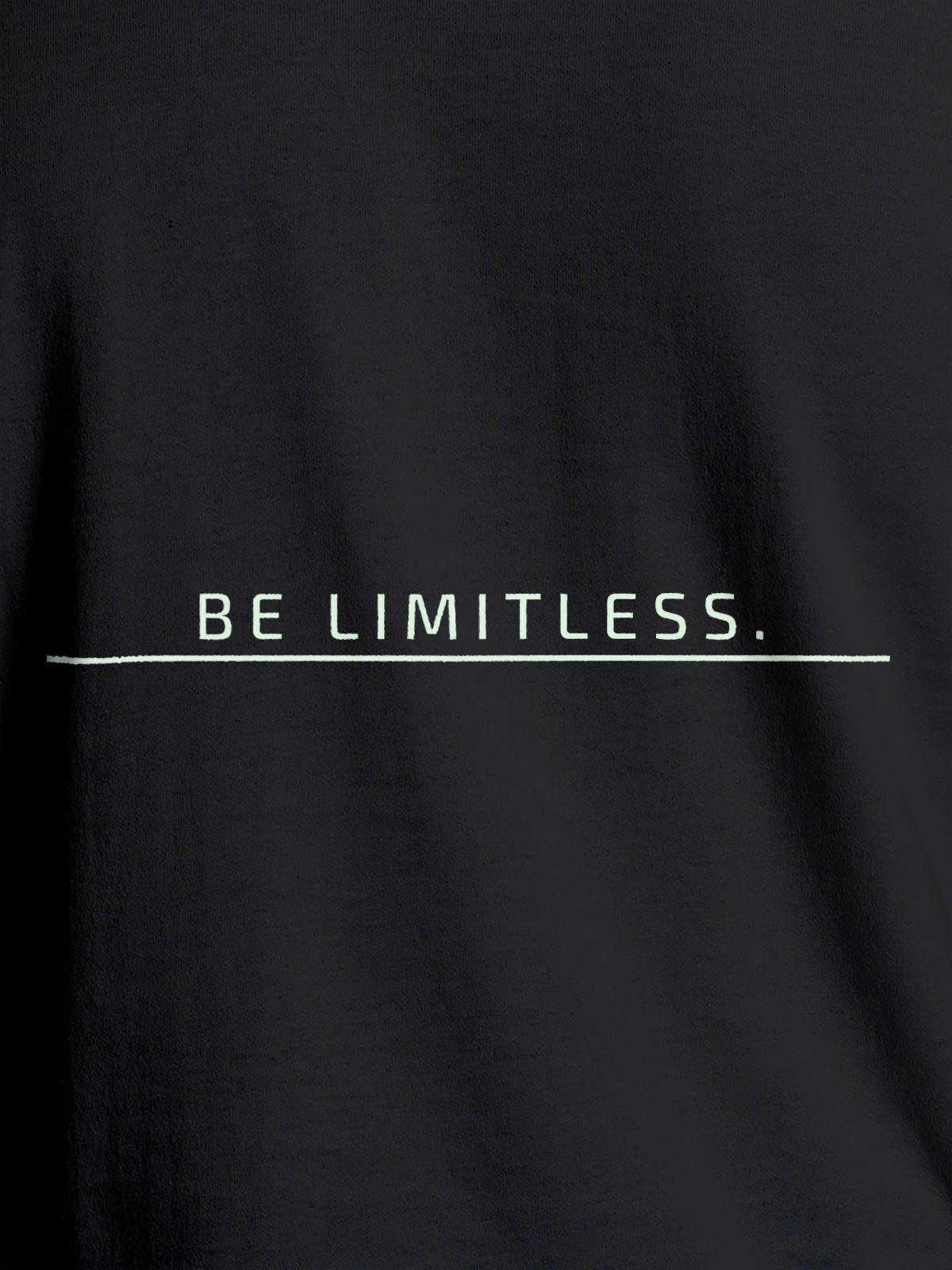 Close up of 'Be Limitless' design on Men's Dark Grey Round Neck T-shirt, highlighting intricate details and vibrant print.