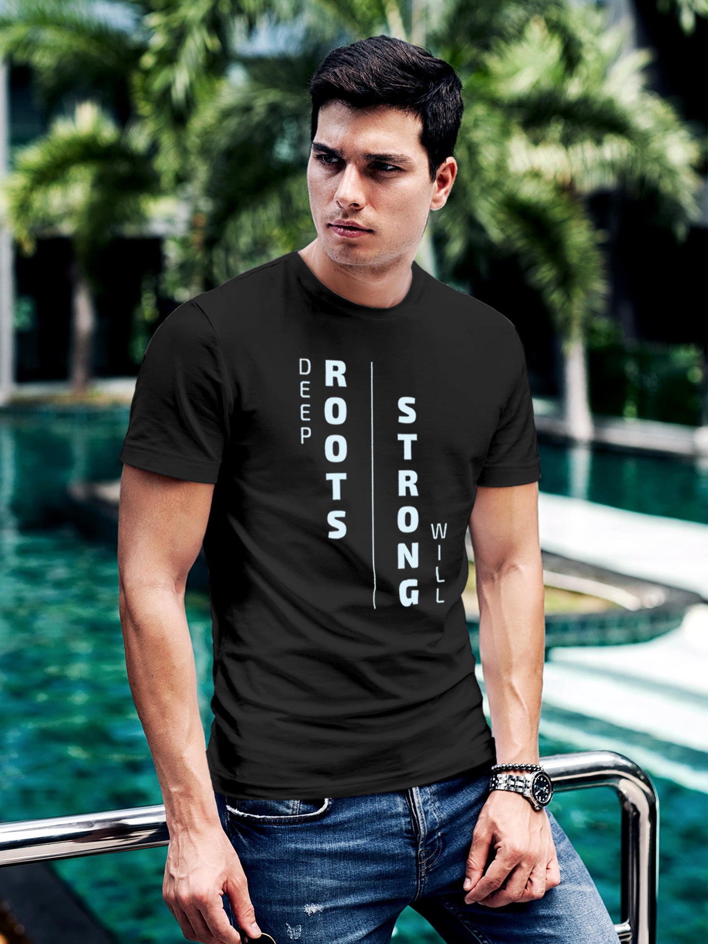 Model wearing Men's Dark Grey Round Neck T-shirt with 'Deep Roots Strong Will' design, offering effortless style and premium comfort