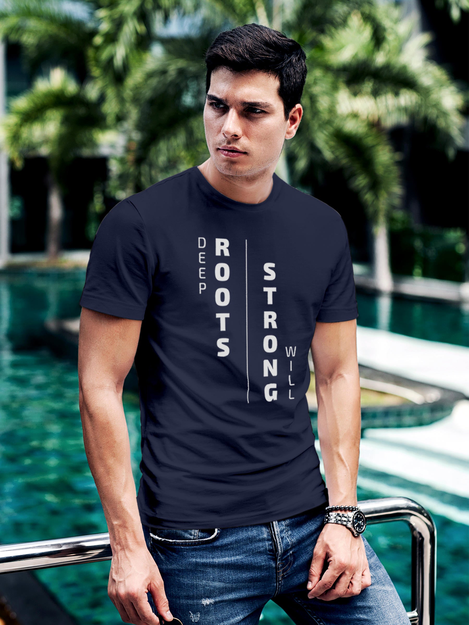 Model wearing Men's Navy Blue Round Neck T-shirt with 'Deep Roots Strong Will' design, offering effortless style and premium comfort
