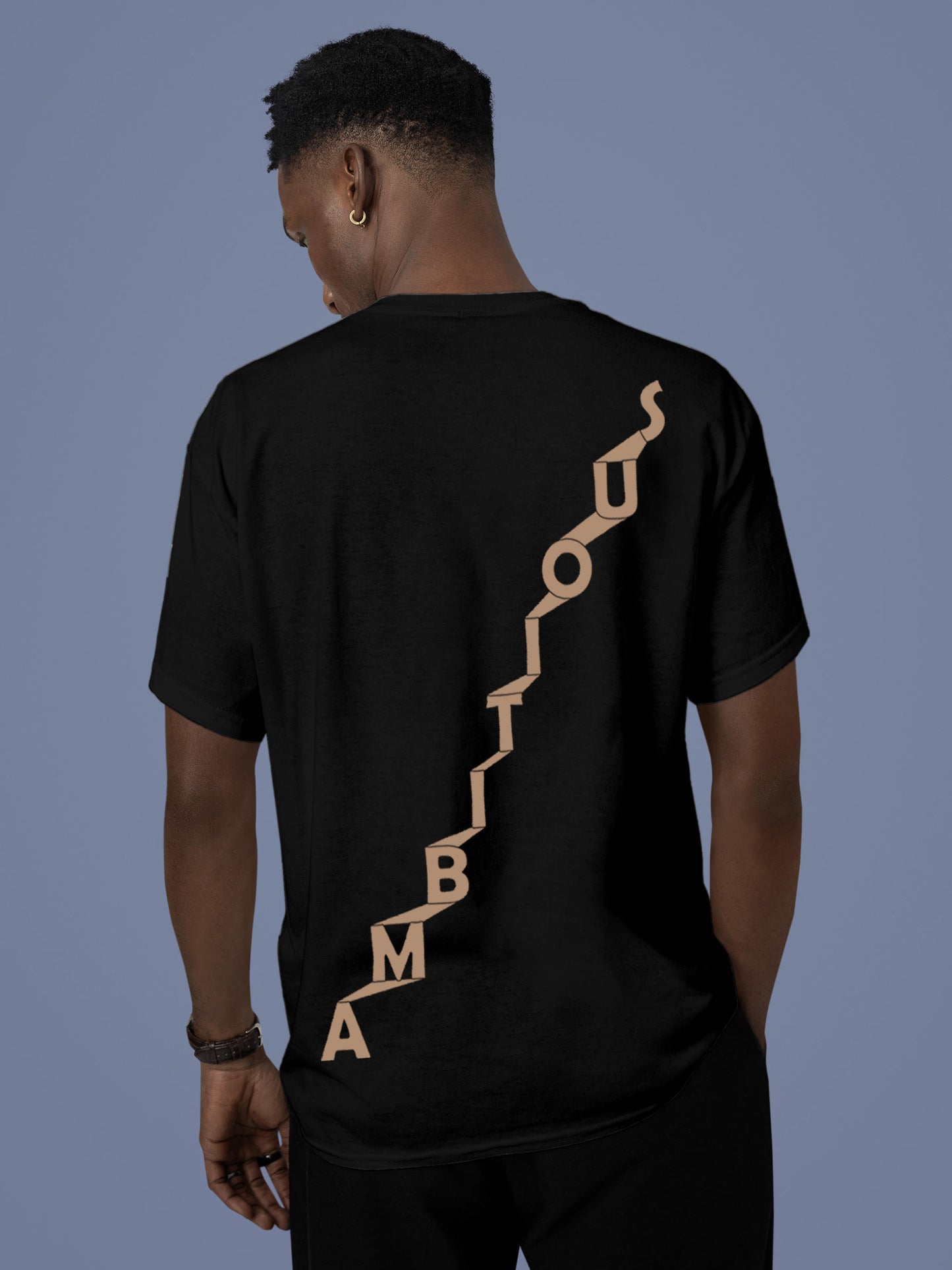 Model wearing Men's Black Round Neck T-shirt with 'Ambitious' design, offering effortless style and premium comfort