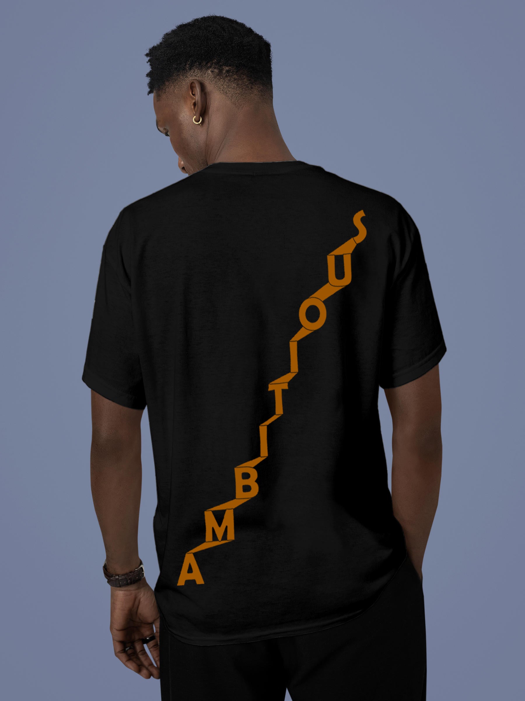 Model wearing Men's Black Round Neck T-shirt with 'Ambitious' design, offering effortless style and premium comfort