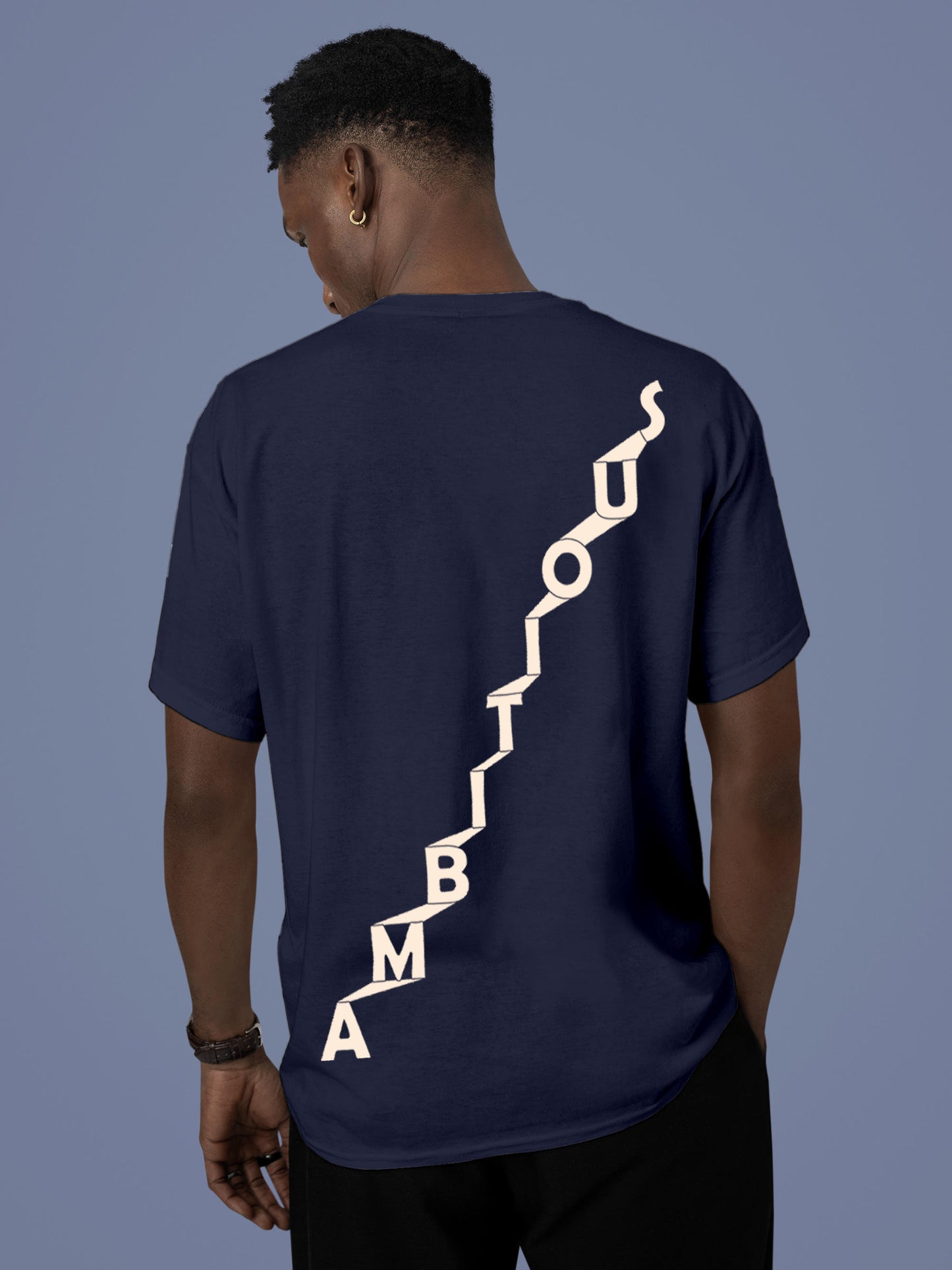 Model wearing Men's Navy Blue Round Neck T-shirt with 'Ambitious' design, offering effortless style and premium comfort