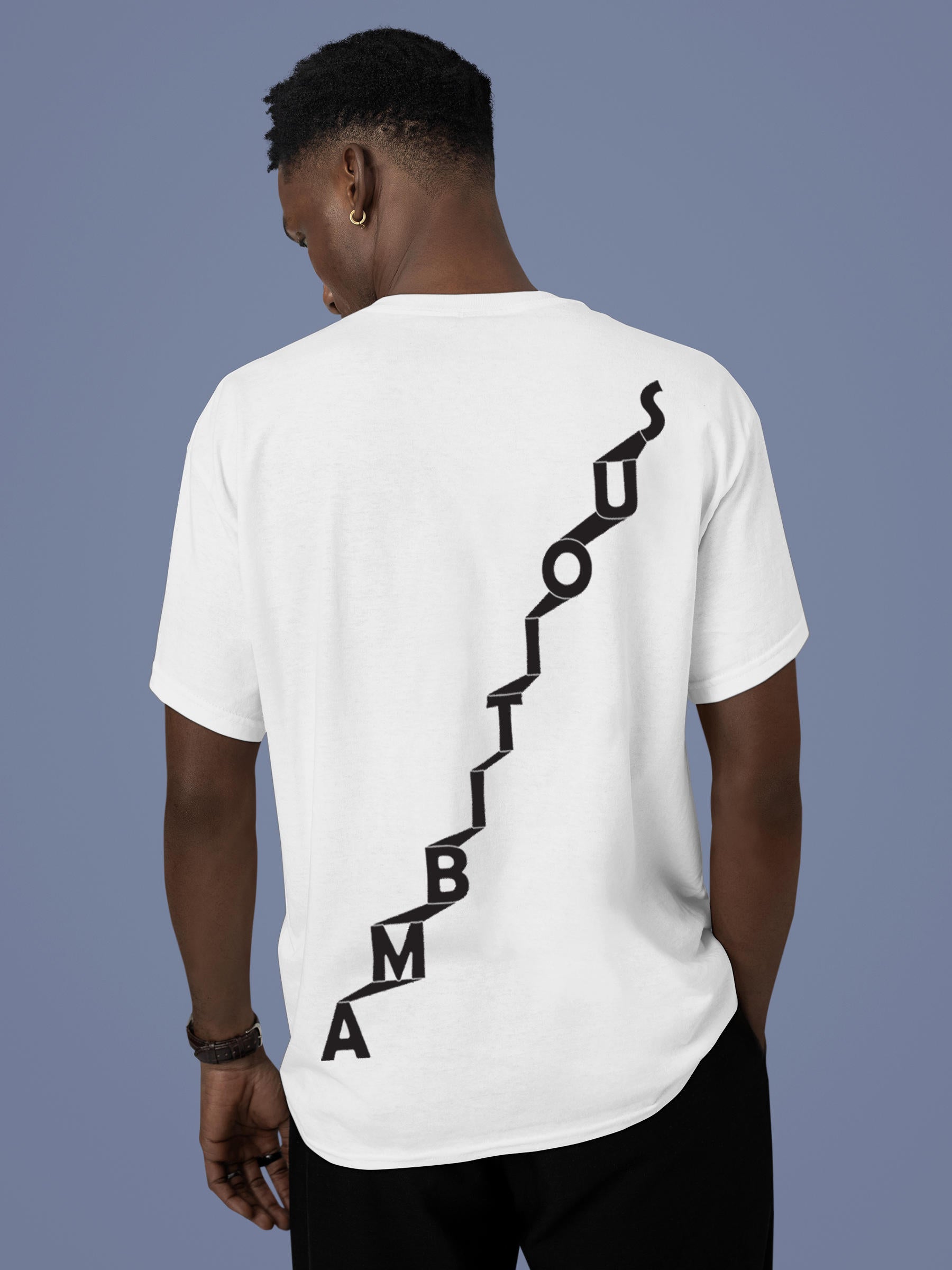 Model wearing Men's White Round Neck T-shirt with 'Ambitious' design, offering effortless style and premium comfort