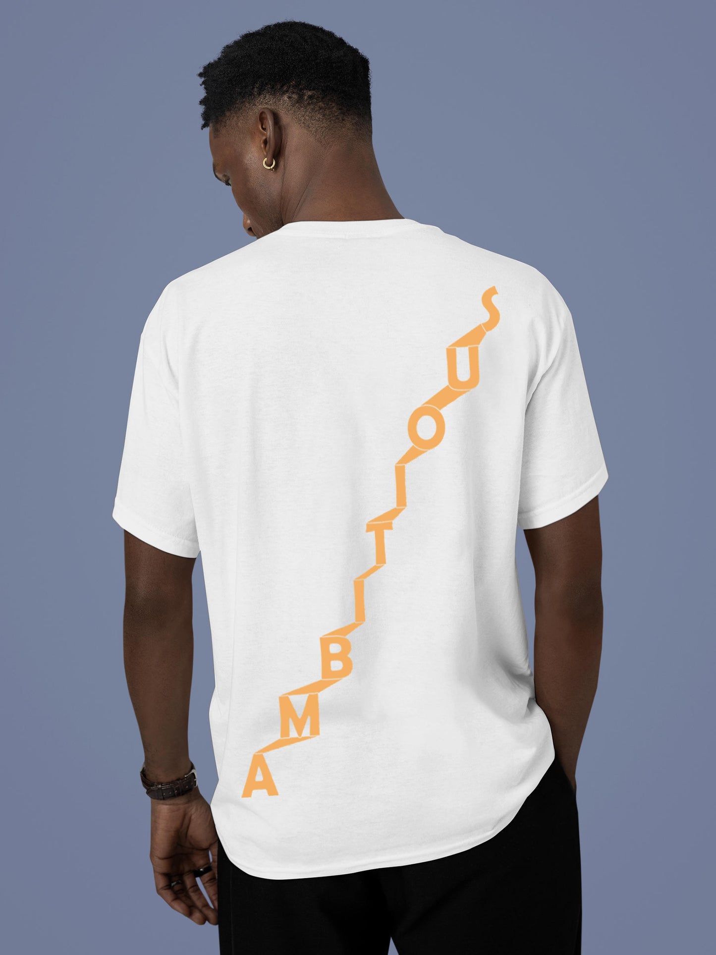Model wearing Men's White Round Neck T-shirt with 'Ambitious' design, offering effortless style and premium comfort
