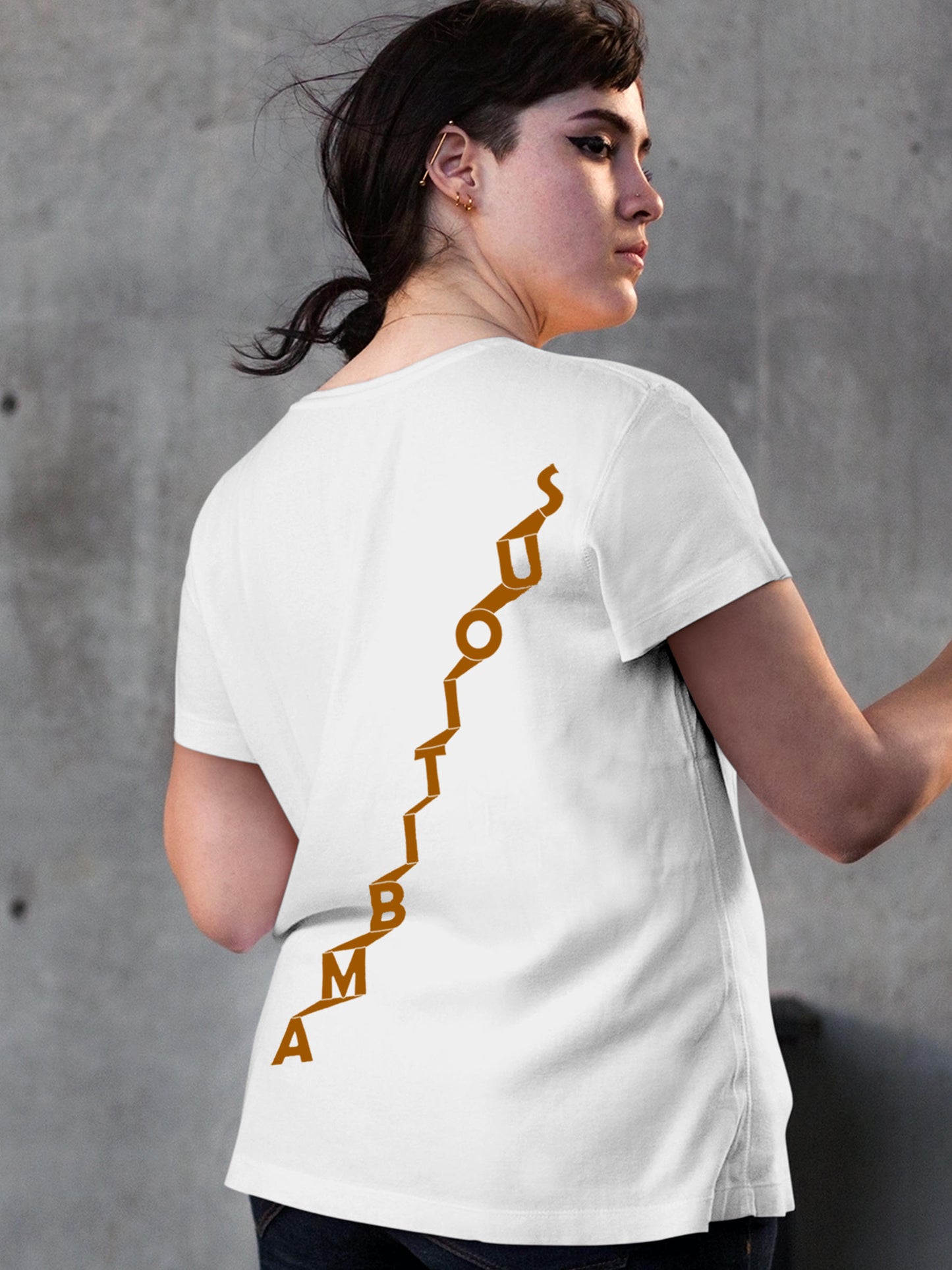 Model wearing Women's White Round Neck T-shirt with 'Ambitious' design, offering effortless style and premium comfort