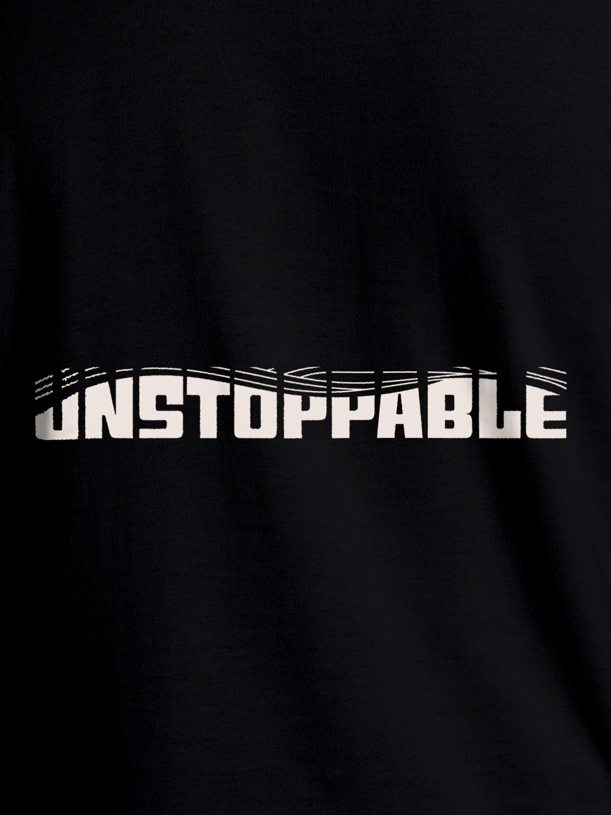 Close up of 'Unstoppable' design on Women's Black Round Neck T-shirt, highlighting intricate details and vibrant print.