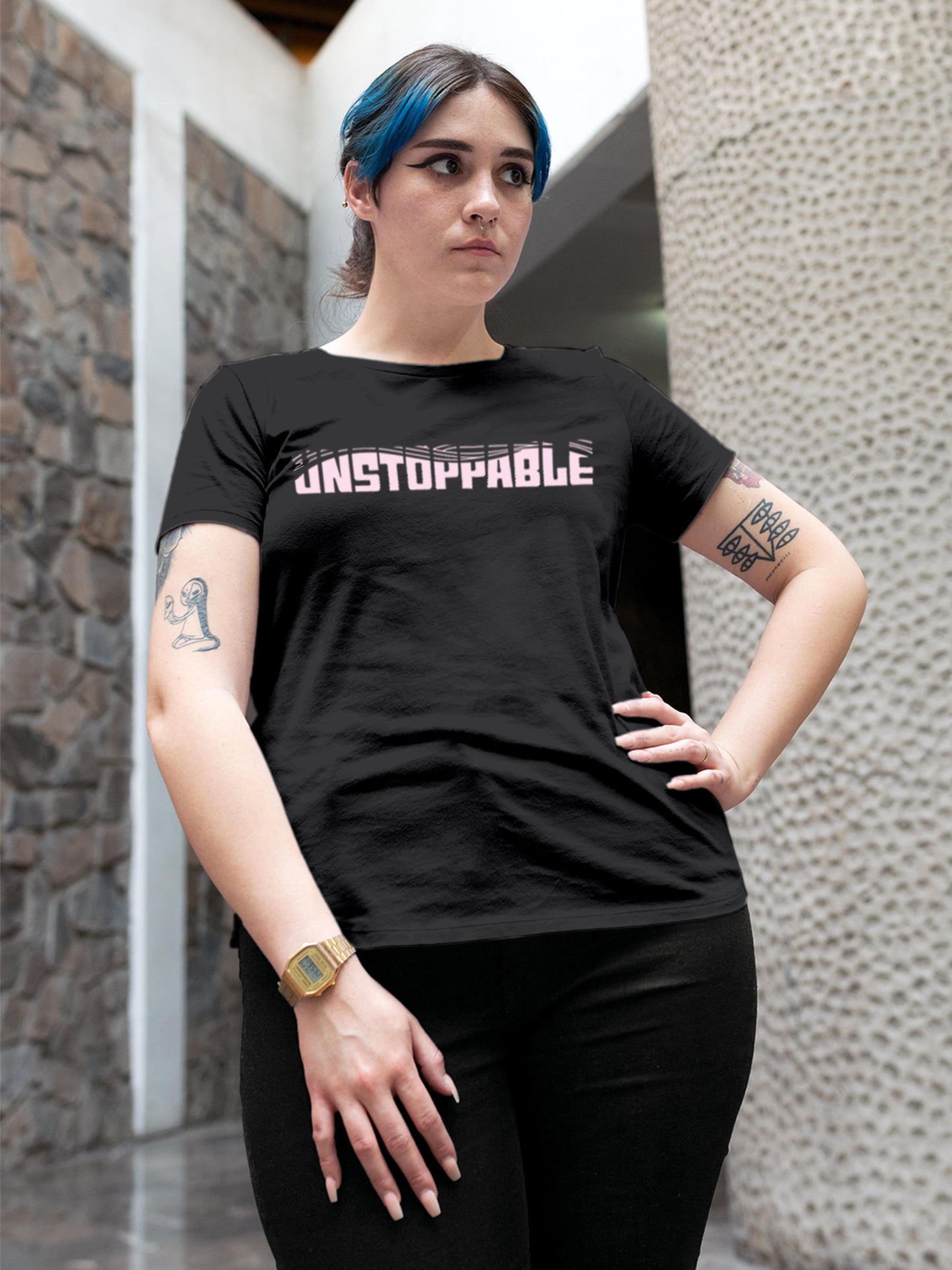 Model wearing Women's Dark Grey Round Neck T-shirt with 'Unstoppable' design, offering effortless style and premium comfort