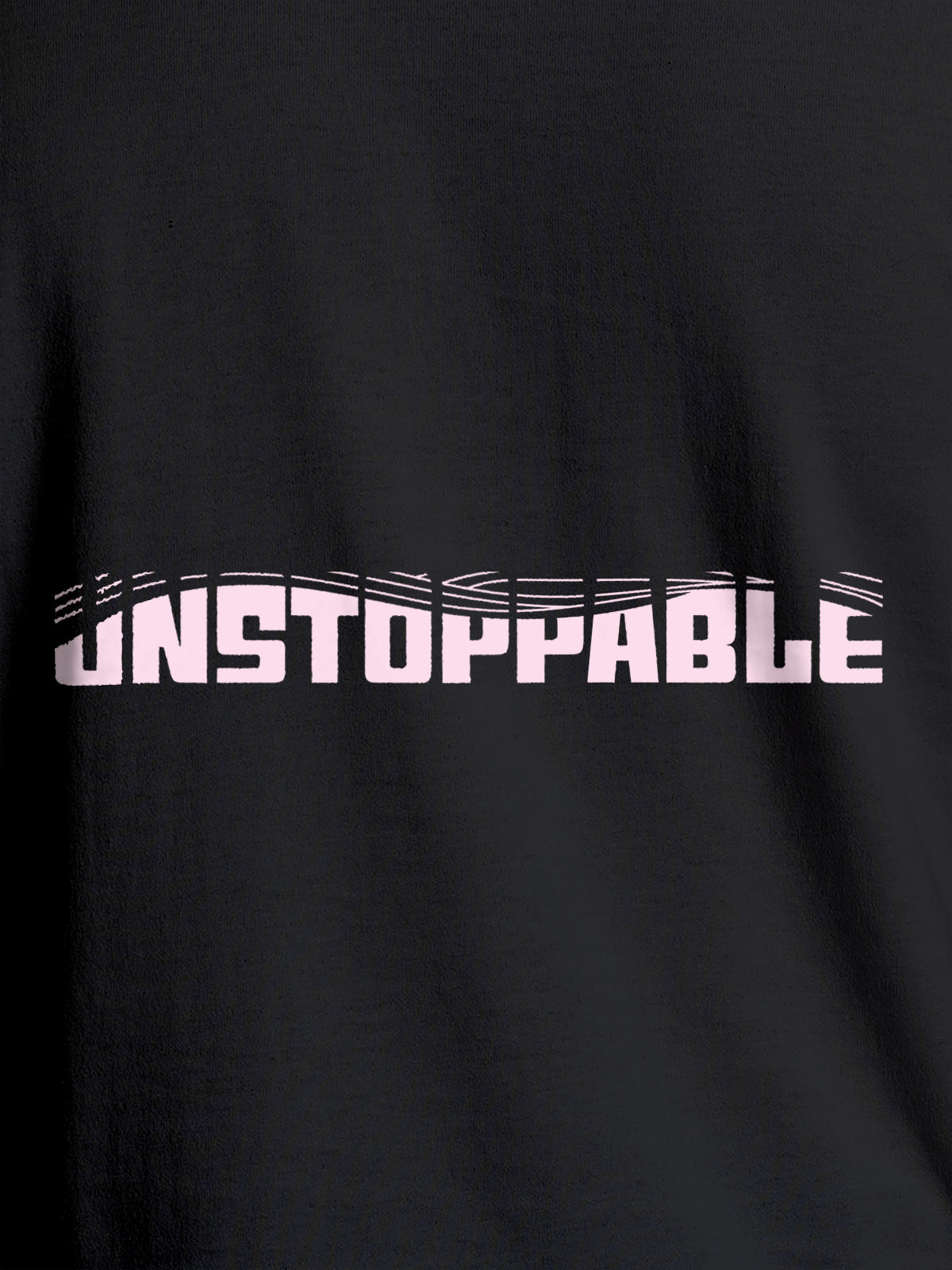 Close up of 'Unstoppable' design on Women's Dark Grey Round Neck T-shirt, highlighting intricate details and vibrant print.