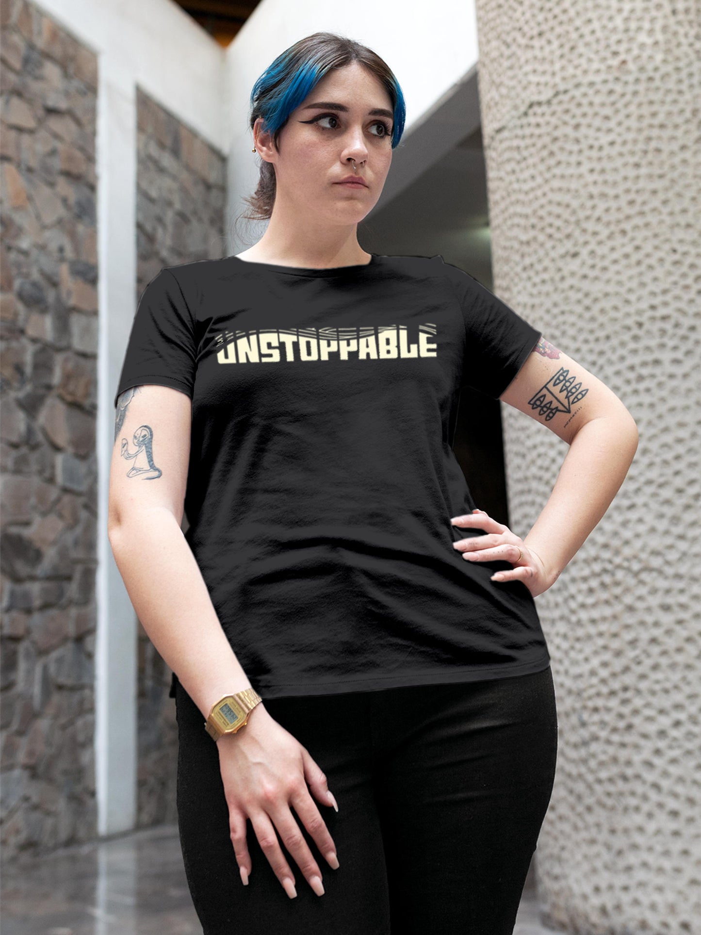 Model wearing Women's Dark Grey Round Neck T-shirt with 'Unstoppable' design, offering effortless style and premium comfort
