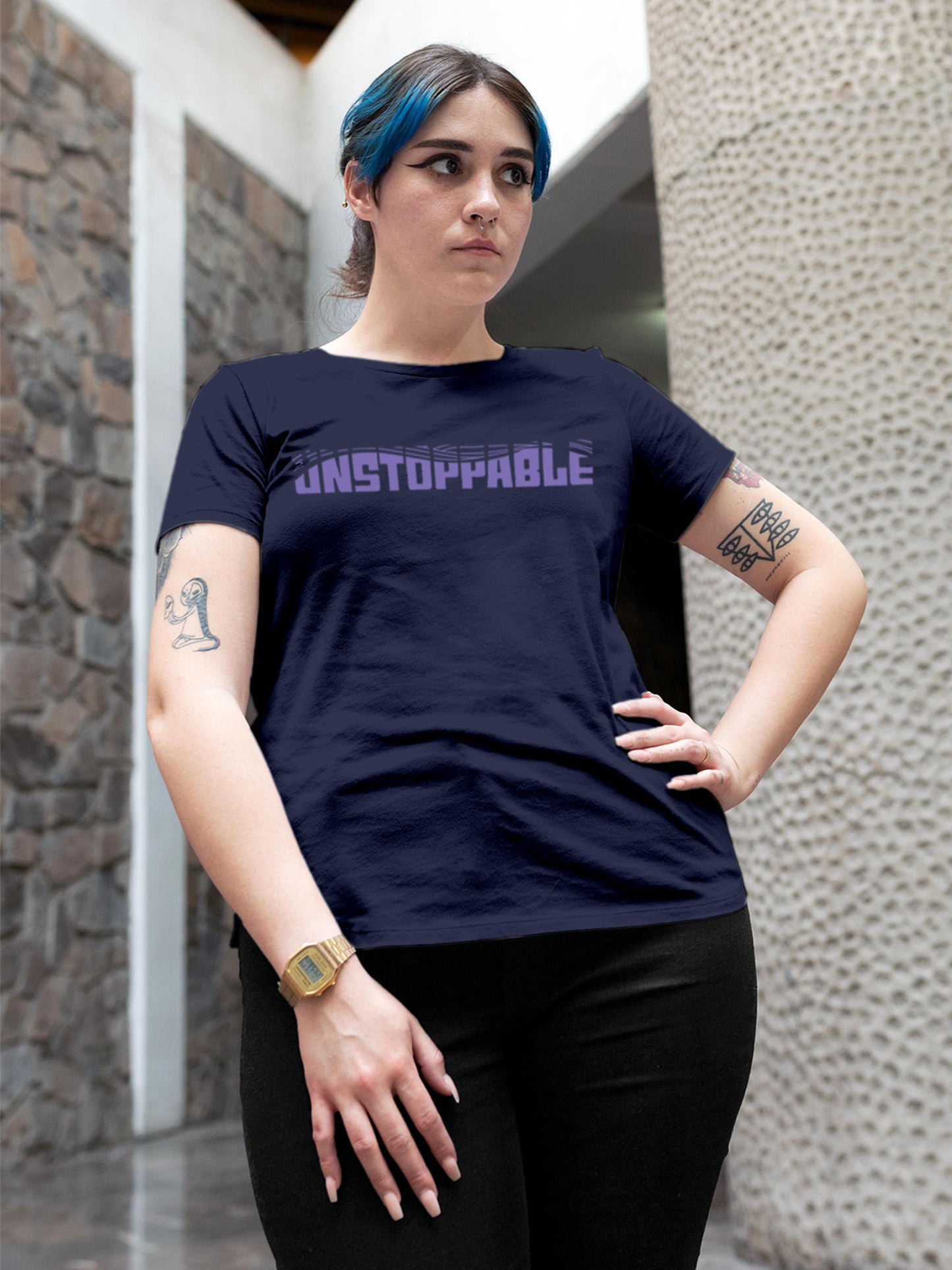 Model wearing Women's Navy Blue Round Neck T-shirt with 'Unstoppable' design, offering effortless style and premium comfort