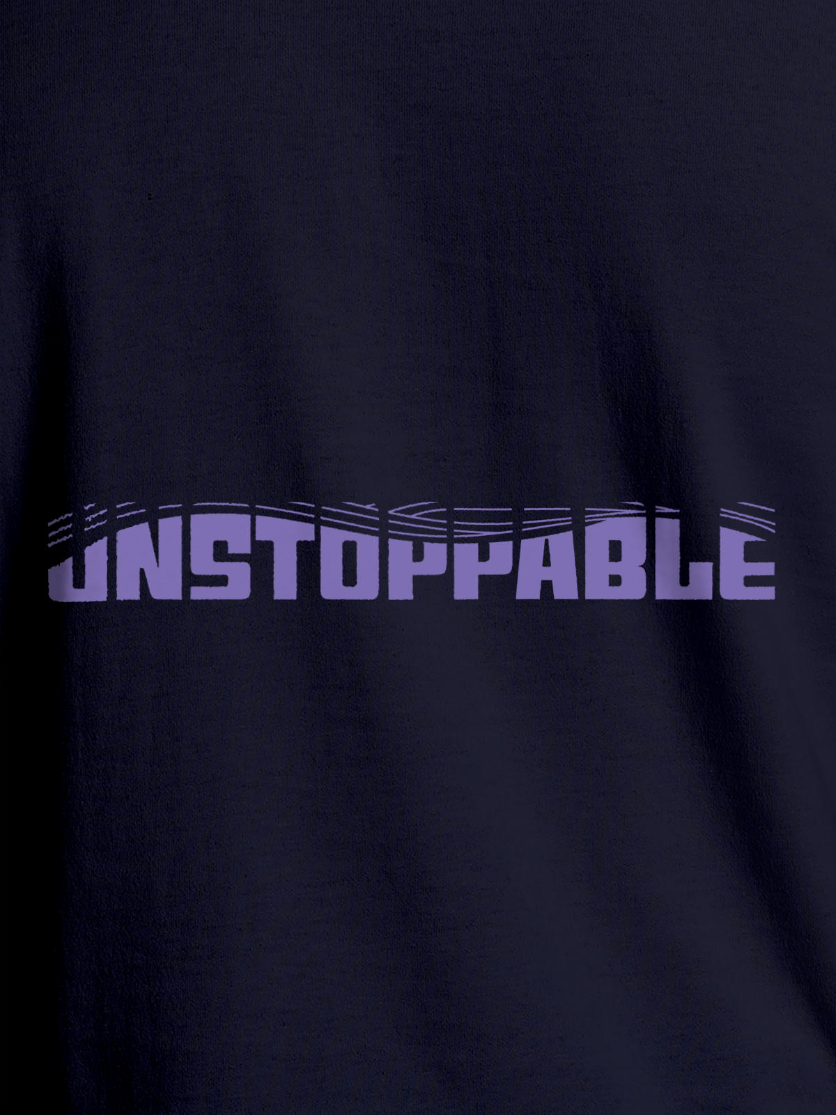 Close up of 'Unstoppable' design on Women's Navy Blue Round Neck T-shirt, highlighting intricate details and vibrant print.