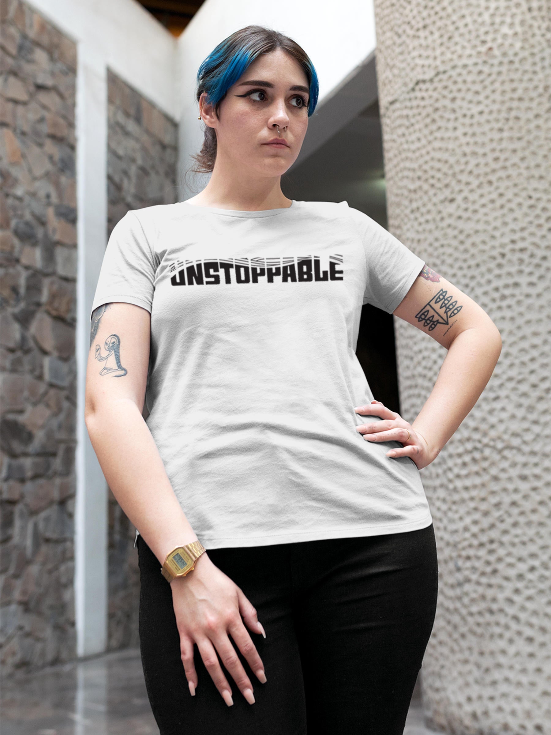 Model wearing Women's White Round Neck T-shirt with 'Unstoppable' design, offering effortless style and premium comfort