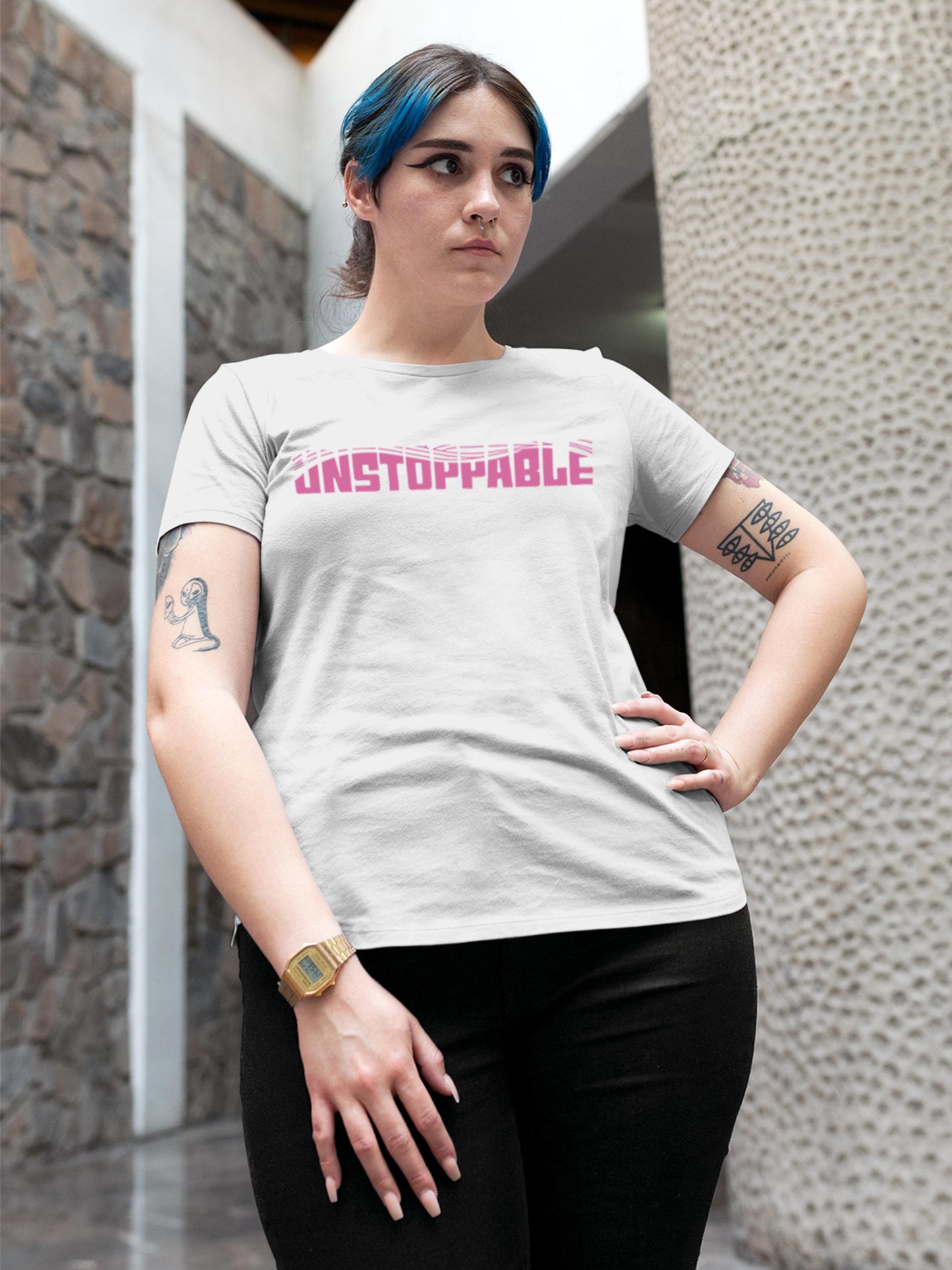 Model wearing Women's White Round Neck T-shirt with 'Unstoppable' design, offering effortless style and premium comfort