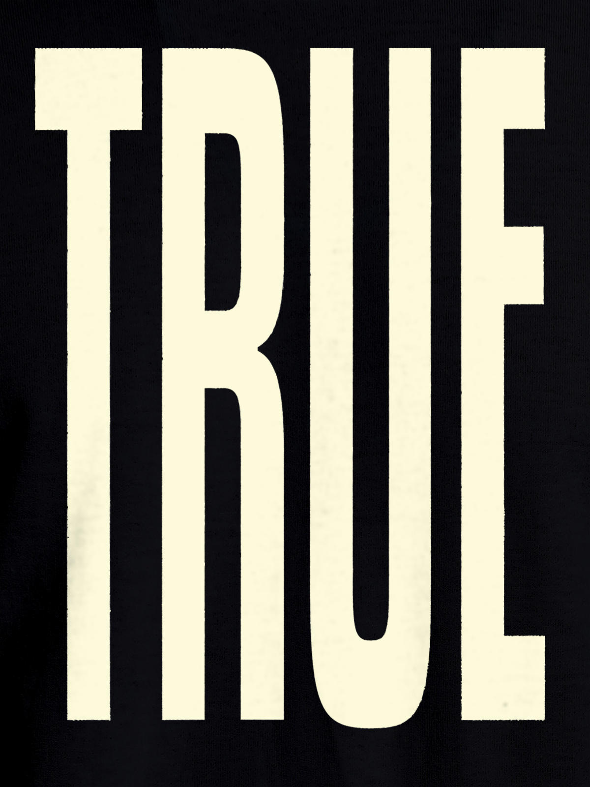 Close up of 'Truth' design on Women's Black Round Neck T-shirt, highlighting intricate details and vibrant print.
