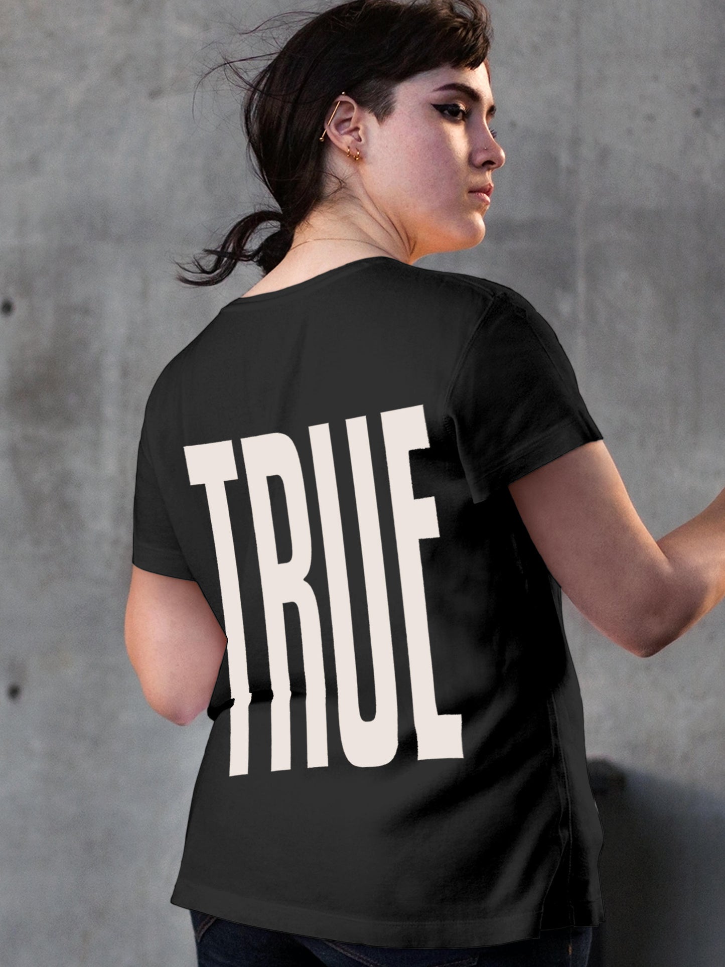 Model wearing Women's Dark Grey Round Neck T-shirt with 'Truth' design, offering effortless style and premium comfort