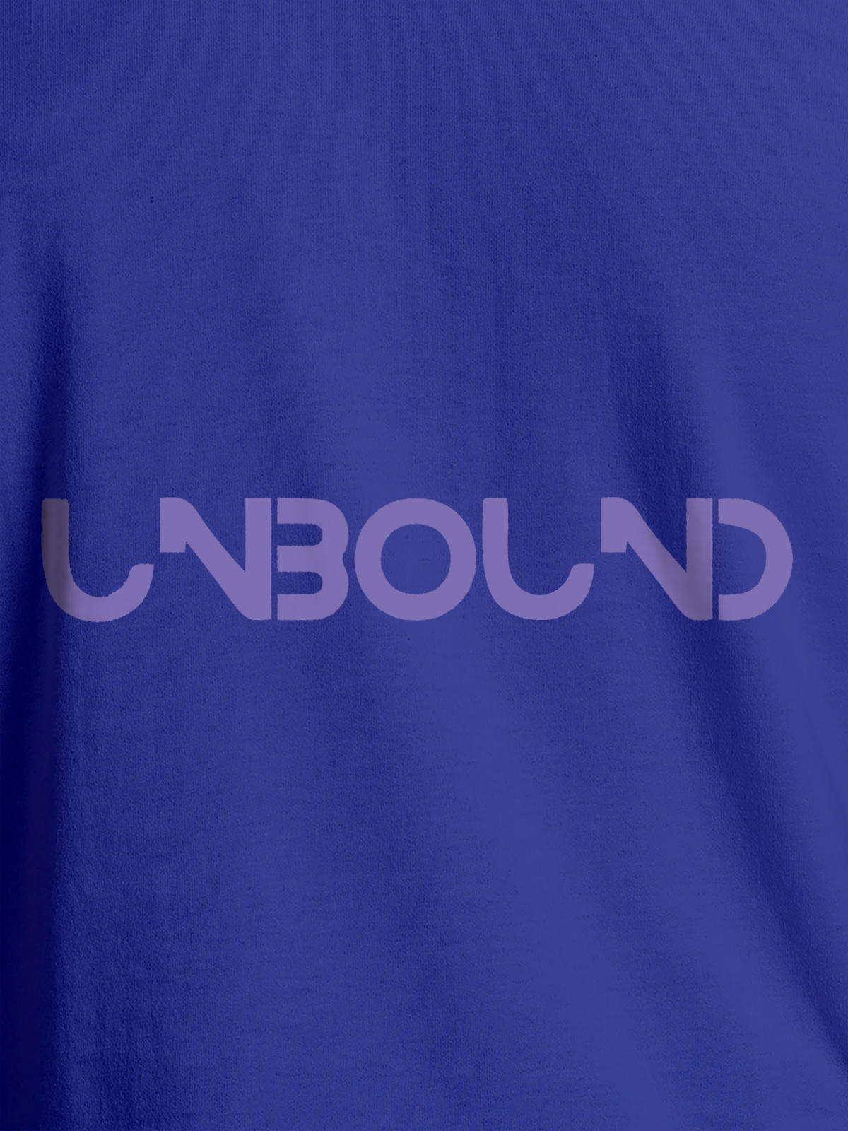 Close up of 'Unbound' design on Men's Blue Round Neck T-shirt, highlighting intricate details and vibrant print.