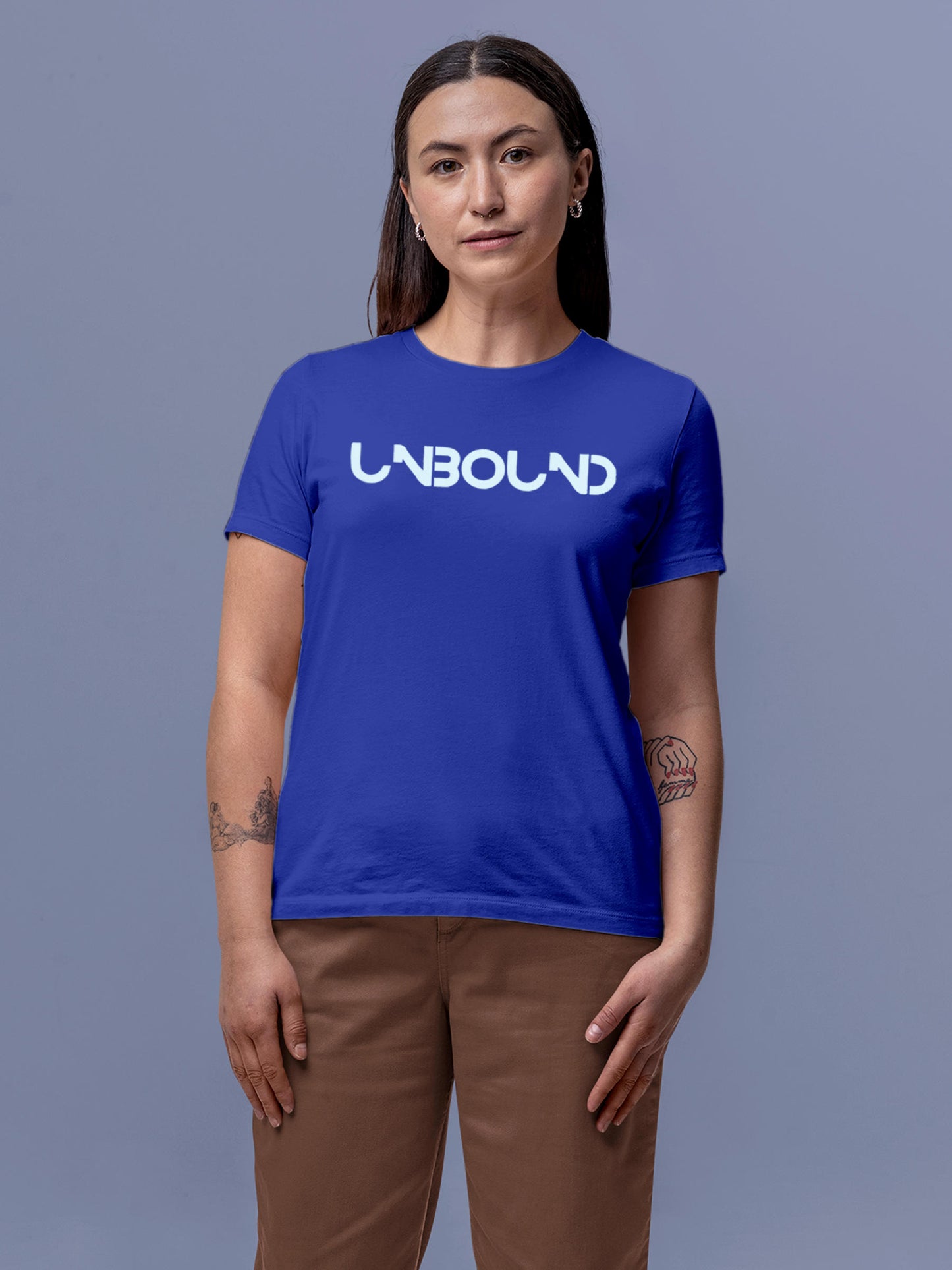 Model wearing Women's Blue Round Neck T-shirt with 'Unbound' design, offering effortless style and premium comfort